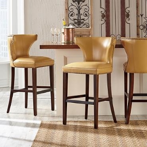 Morgan stools feature a graceful, contemporary style with a beautiful sculpted back. They are available in a number of colorful leather options. These stools are super comfortable with a spacious 23” wide seat!