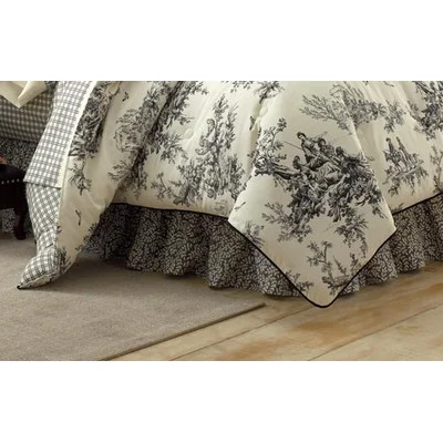 Toile Fabric is a timeless choice in black and white – This Bouvier comforter set by Thomasville at Home can be found at www.wayfair.com. 