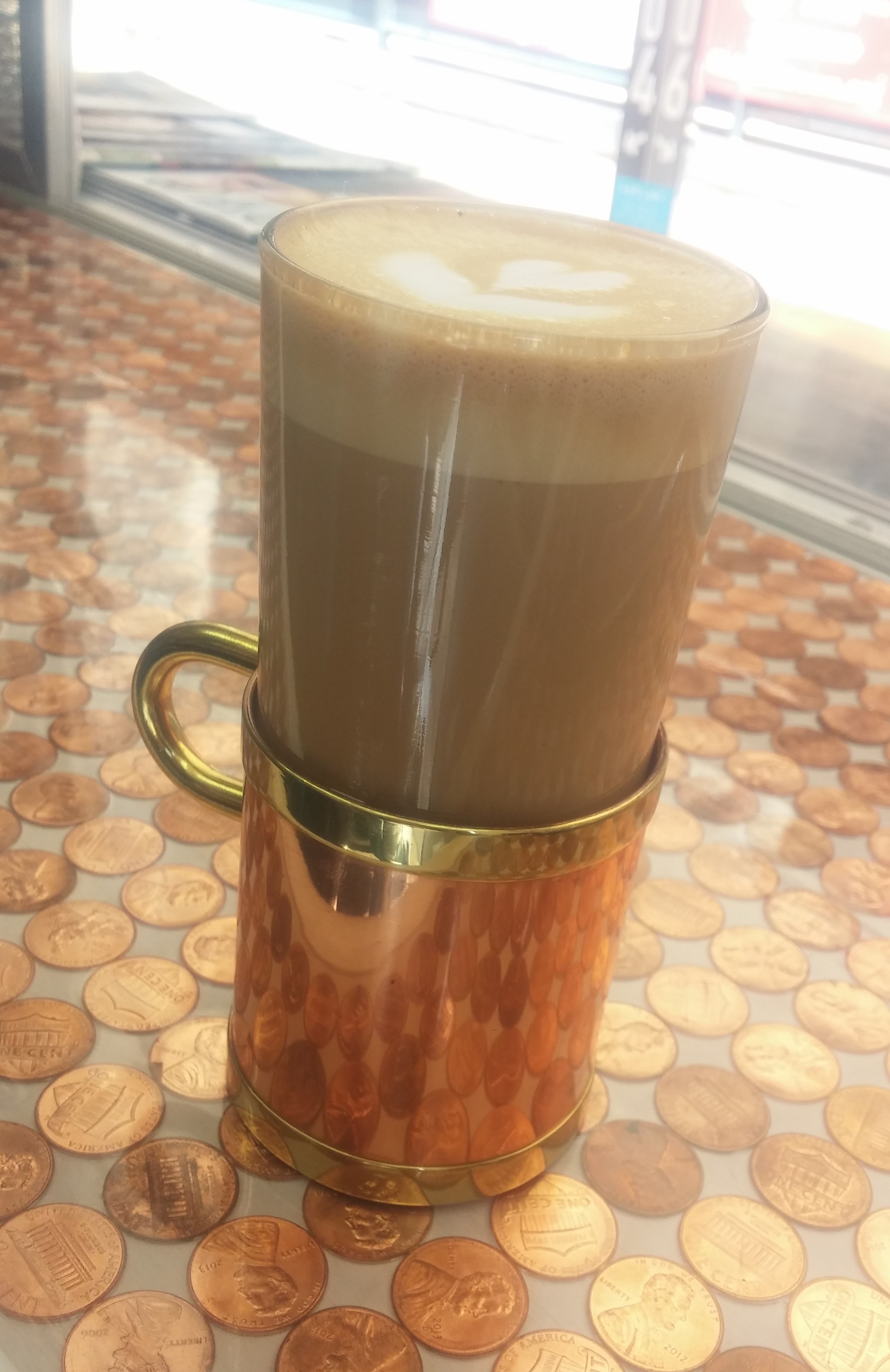 The Cortado, displayed beautifully in a 'for here' glass to relax with