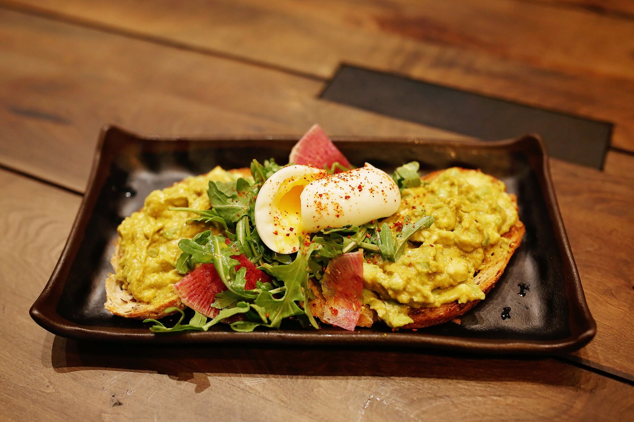 Avocado Toast - egg, greens, radish, olive oil and lemon