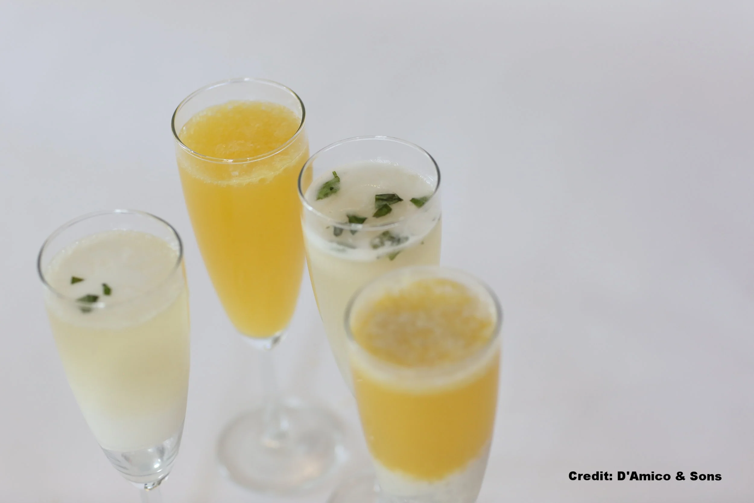 Mimosa, orange cream mimosa and Sgroppino, a house-made basil lemonade champagne spritz with Izzy’s lemon basil sorbetto.jpg
