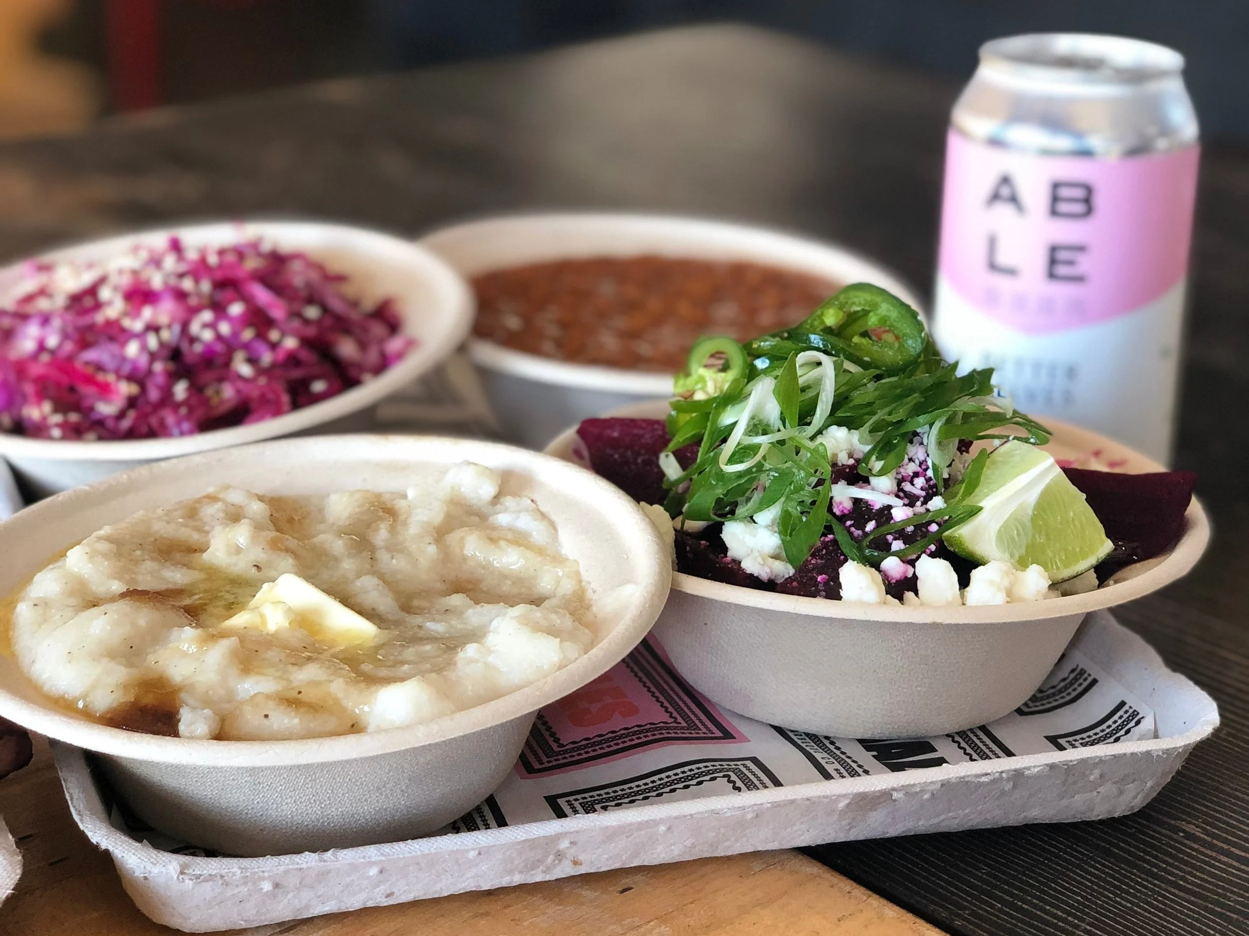 Brown Sugar and Butter Grits, Pickled Beets Salad with Queso Fresco, Meaty Beans, Red Cabbage Slaw