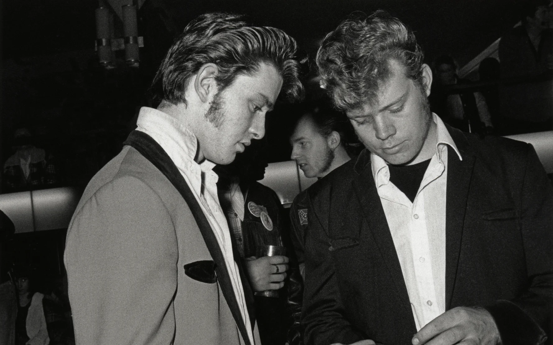 Two Teddy boys counting their money, Rock n' Roll weekender, Caister, Great Yarmouth, UK 1980 © Janette Beckman / PYMCA