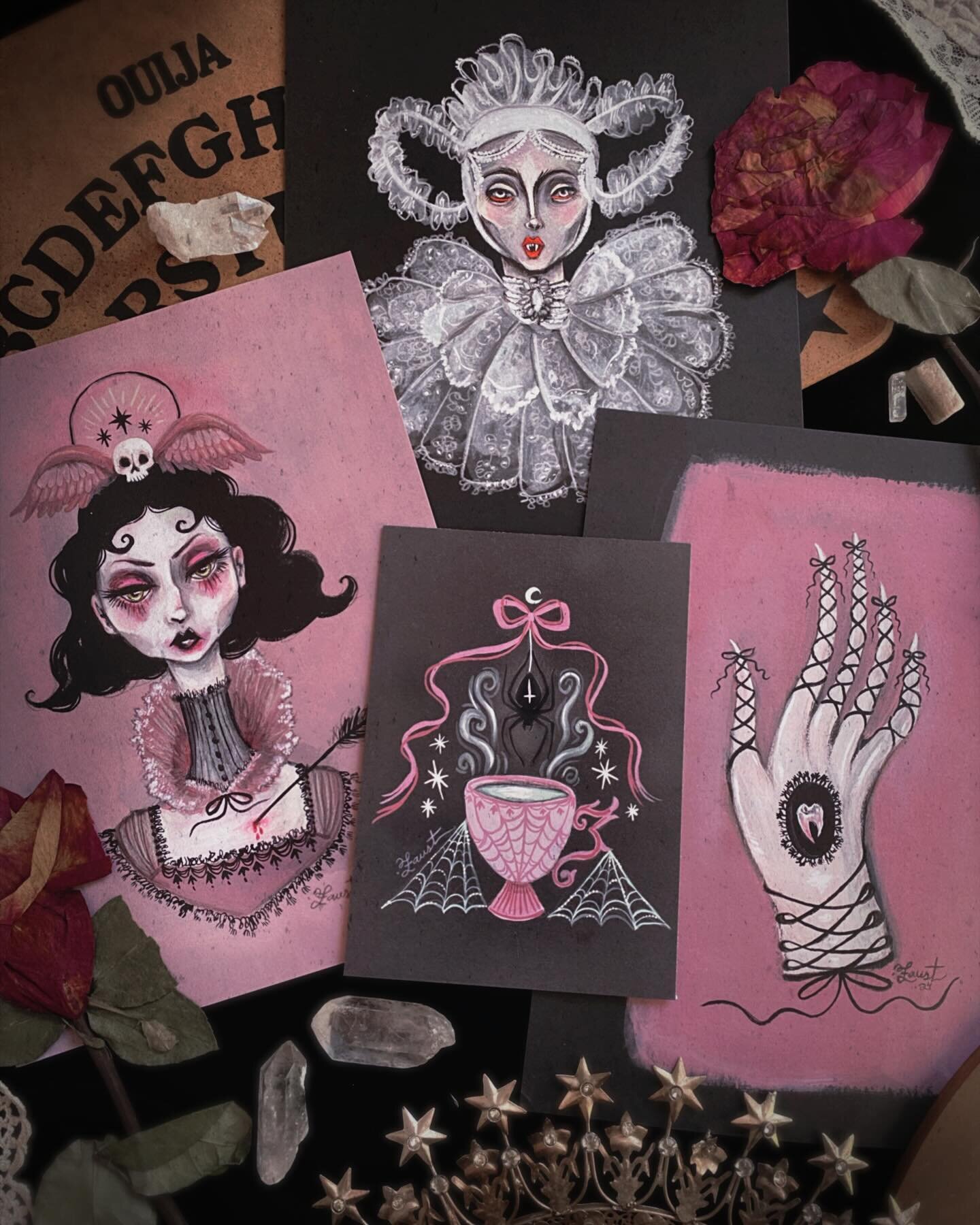 A look at more NEW &amp; restocking prints coming tomorrow:
🏹Cupid Countess
🍷Vampire Lucy
🎀To Remember
🕷️The Teacup Widow 

They will all be available tomorrow at 10amET✨✨✨