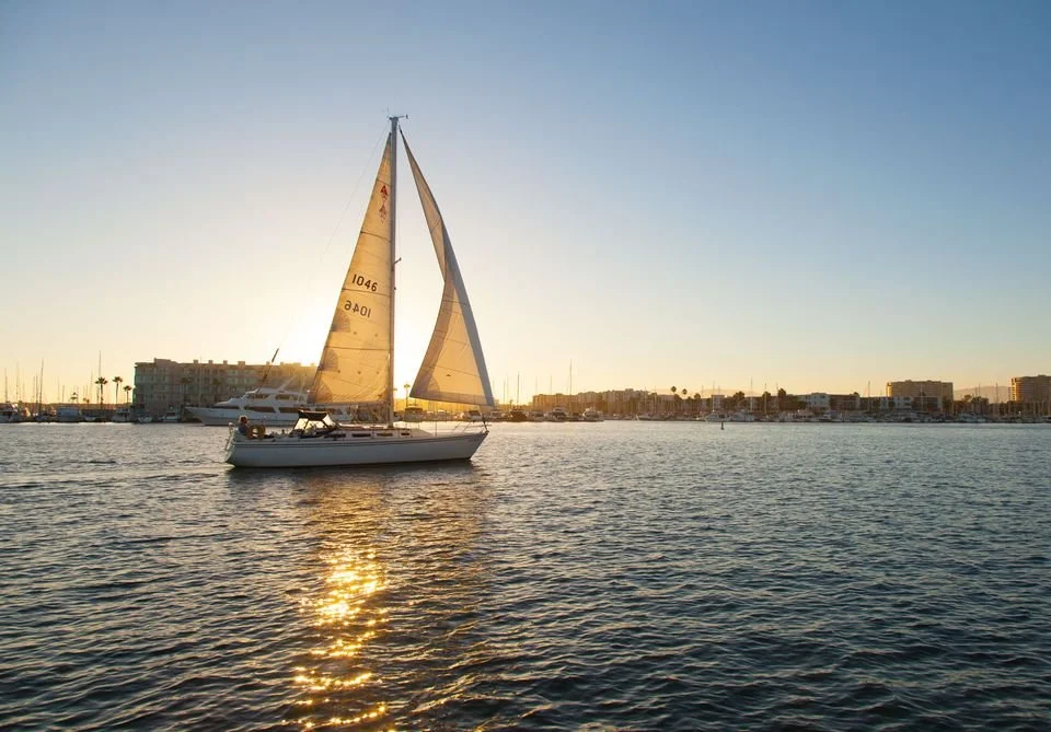 sunset_sail_in_the_marina_harbor_l-5674ab125f9b586a9e4af07a.jpg