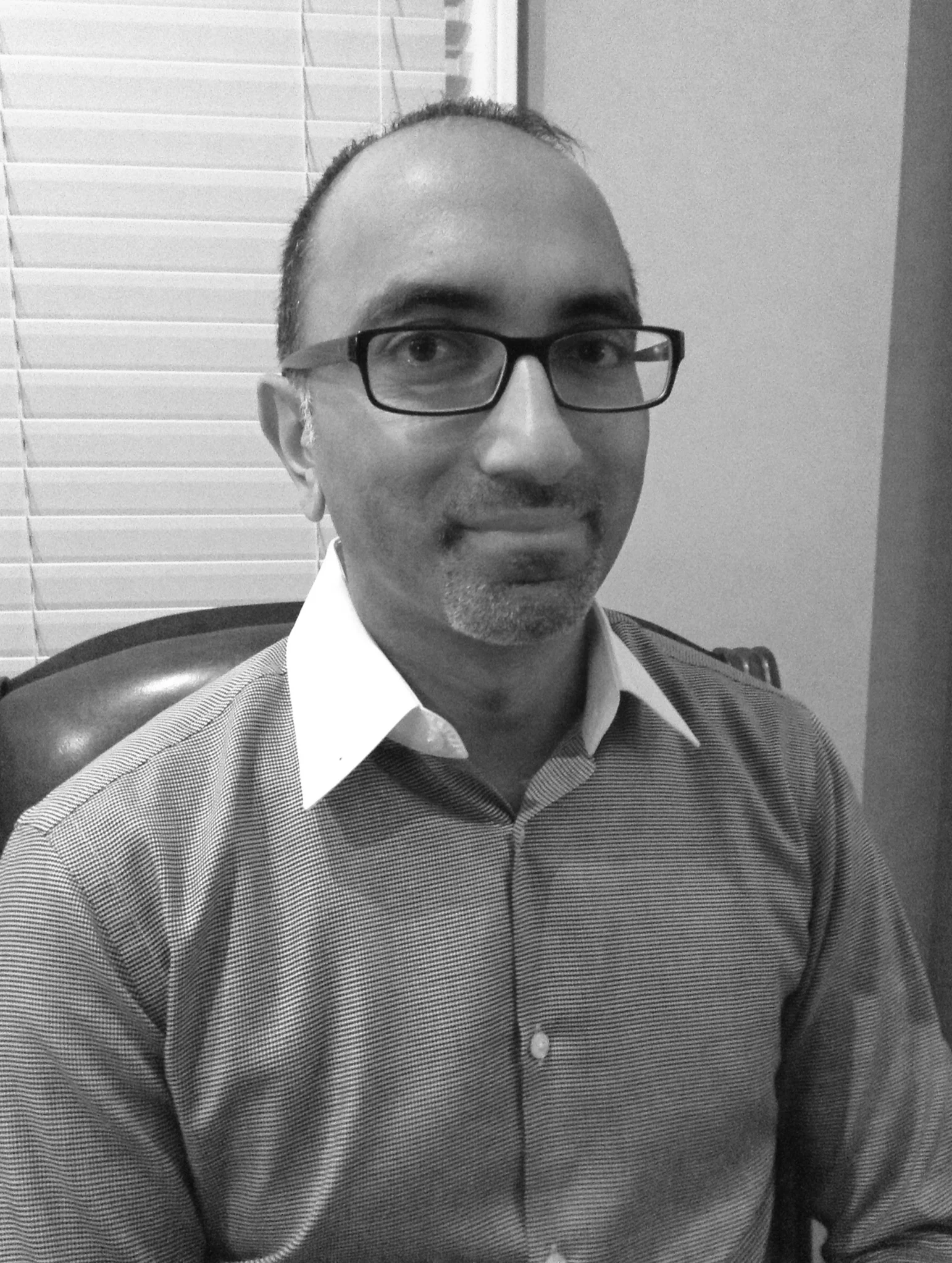 Vik Reddy is a practicing plastic surgeon and a regular contributor to the *Detroit Free Press*. He serves as the Medical Director of Quality at Henry Ford Macomb Hospital. Read his piece, “ Stuck ” in the Spring 2015 Intima.