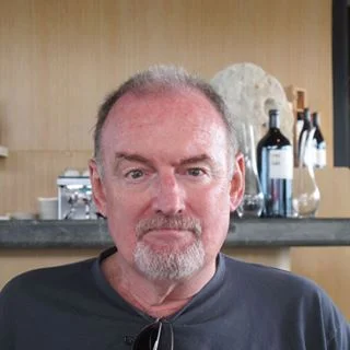 Michael Fredrick Geisser writes in Warren, Rhode Island, in the tiny enclave of Touisset that overlooks the Kickemuit River. He lives there with his wife, Anna, and their wonder Westy, Kosmo. Geisser writes non-fiction, fiction, and personal essays. His essay " Night Trip " appears in the Fall 2015 Intima.