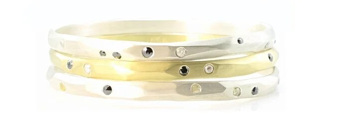Solid 18k gold and sterling silver, carved bangle bracelets with flush-set diamonds