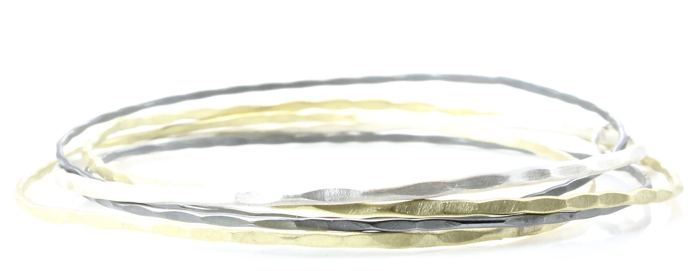 5 link, hammered bangle bracelets in 18k gold, sterling silver and oxidized silver