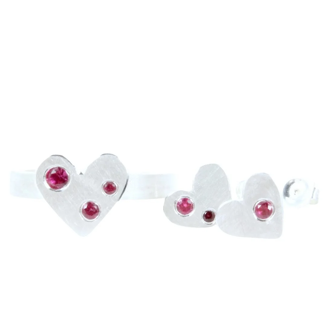 Sweet, sterling silver heart stud earrings and ring with flush-set Rubies for Valentine&rsquo;s Day! Available at @loriwarnergallery 
#valentines2025 #rubies #handmadejewelry #oneofakindjewelry #valentinesjewelry