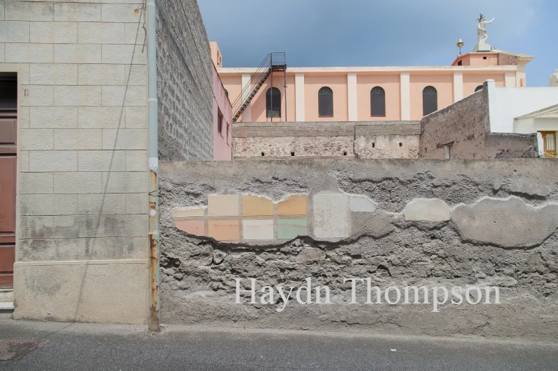 Coloured Wall and Church - Canneto, Lipary, Sicily.jpg