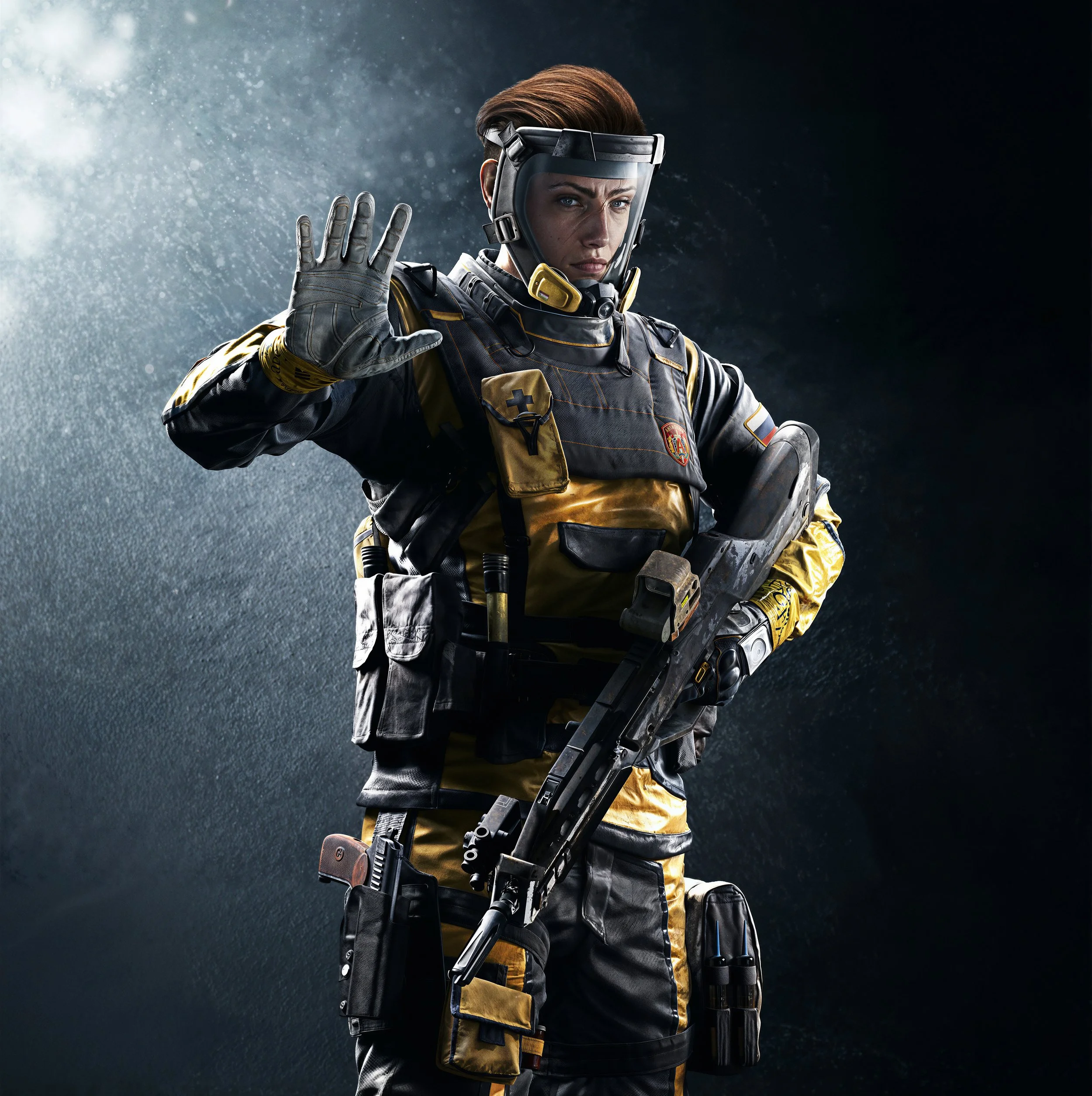 A person dressed as a futuristic soldier, wearing a helmet with a transparent face shield, tactical gear, and holding a high-tech weapon, striking a pose with one hand raised in a stop gesture. The background is dark with a textured, gradient effect.
