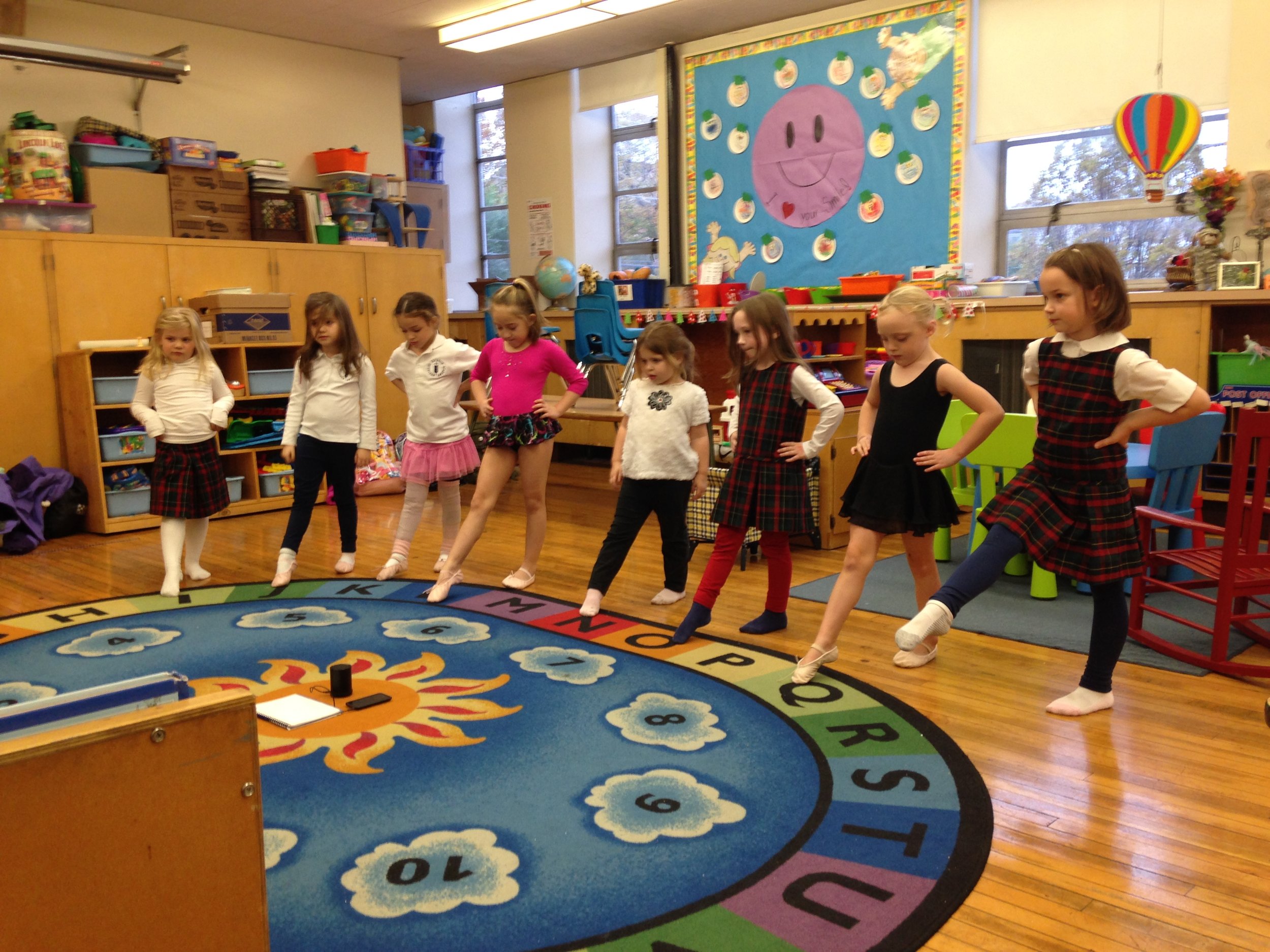 Northside Catholic Academy Students in Ms. Laura's Storytime Ballet Show of their point skills! 
