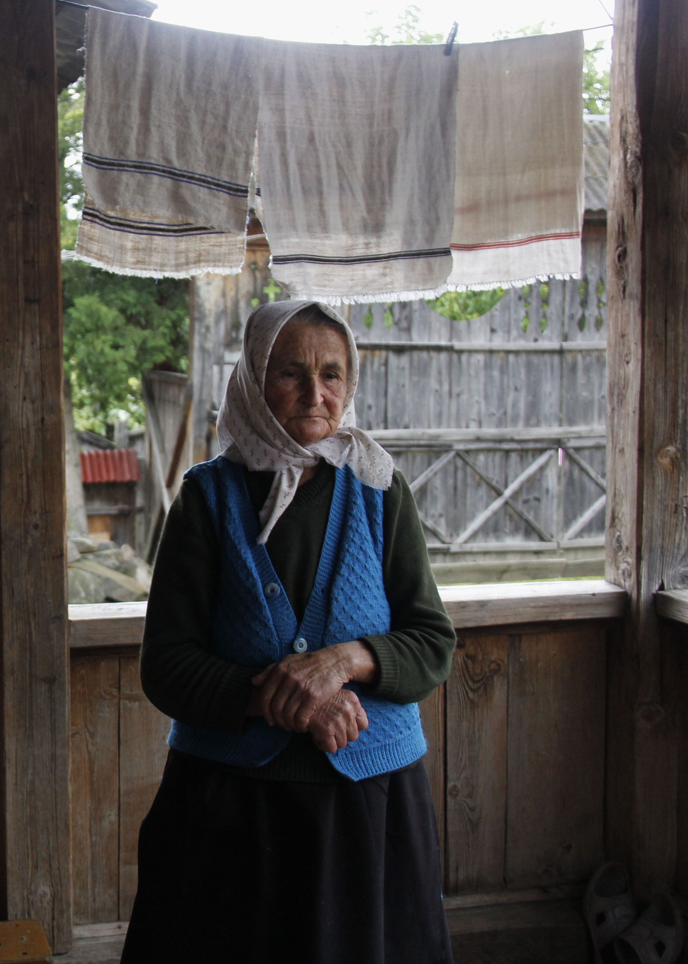 Babuta Bladea looks adoringly upon her granddaughter, Marii. Babuta is a family woman. With a lot of children and grandchildren Babuta surrounds herself with the love from the people close to her.