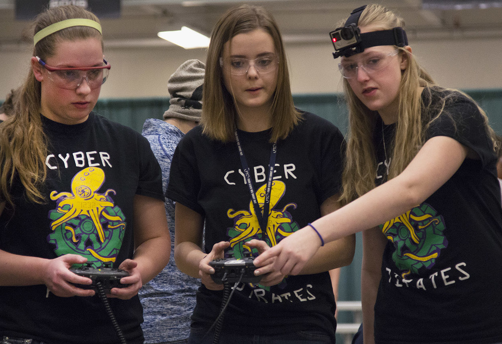  From left, Allie Floyd, 18, Hannah Engler, 15, and Kaitlyn De Kan, 17, strategize during their competition at the VEX Missouri State Robotics Championship at Rolla on Saturday. Their group, the Cyber Pirates, have four members but only three are all