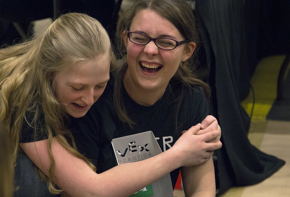  From left, Kaitlyn De Kan, 17, and Shannon Coupland, 17, celebrate after winning the Award of Excellence at the VEX Missouri State Robotics Championship in Rolla on Saturday. Winning this award means that they will have the chance to compete in the 