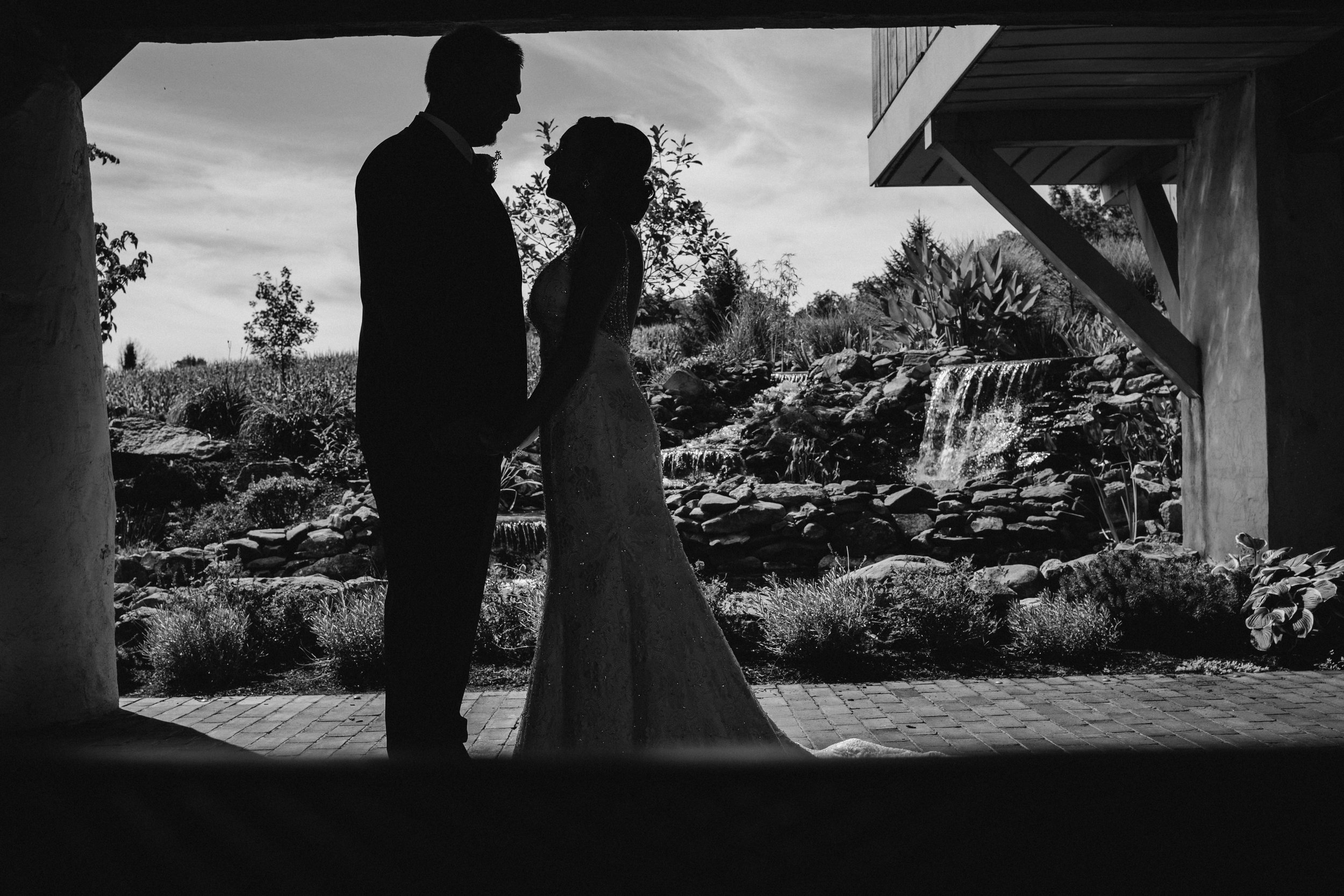 A black and white silhouette of a couple.