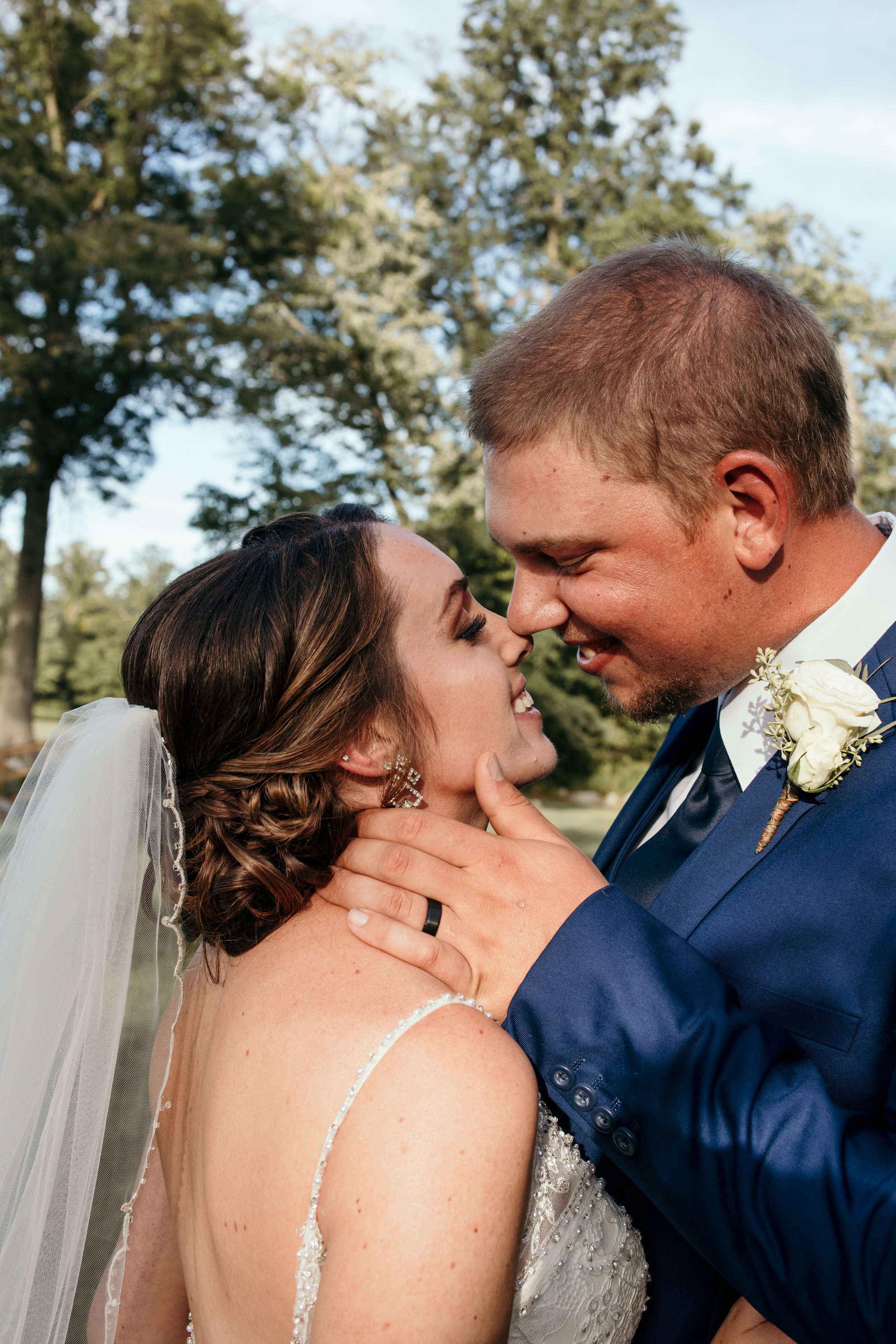 Wedding pose, nose to nose.