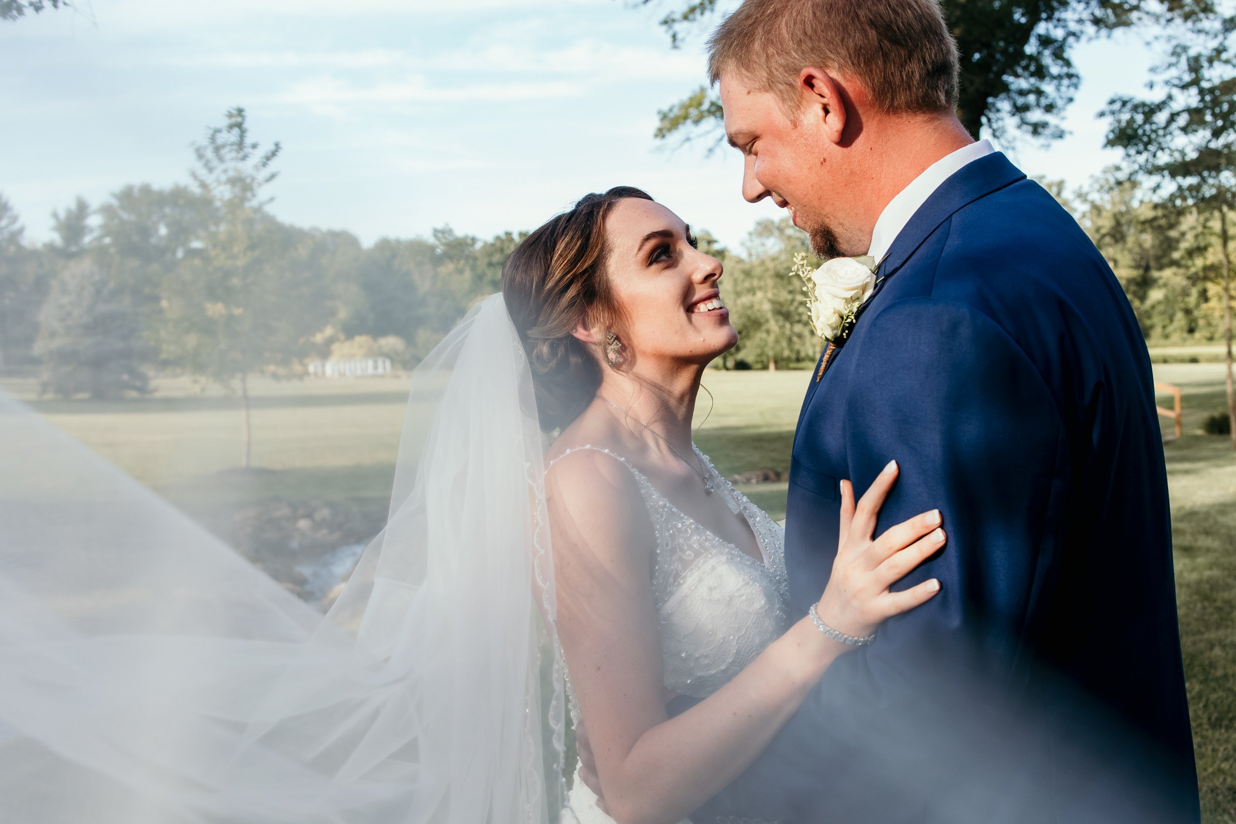 Wedding pose with cathedral veil.