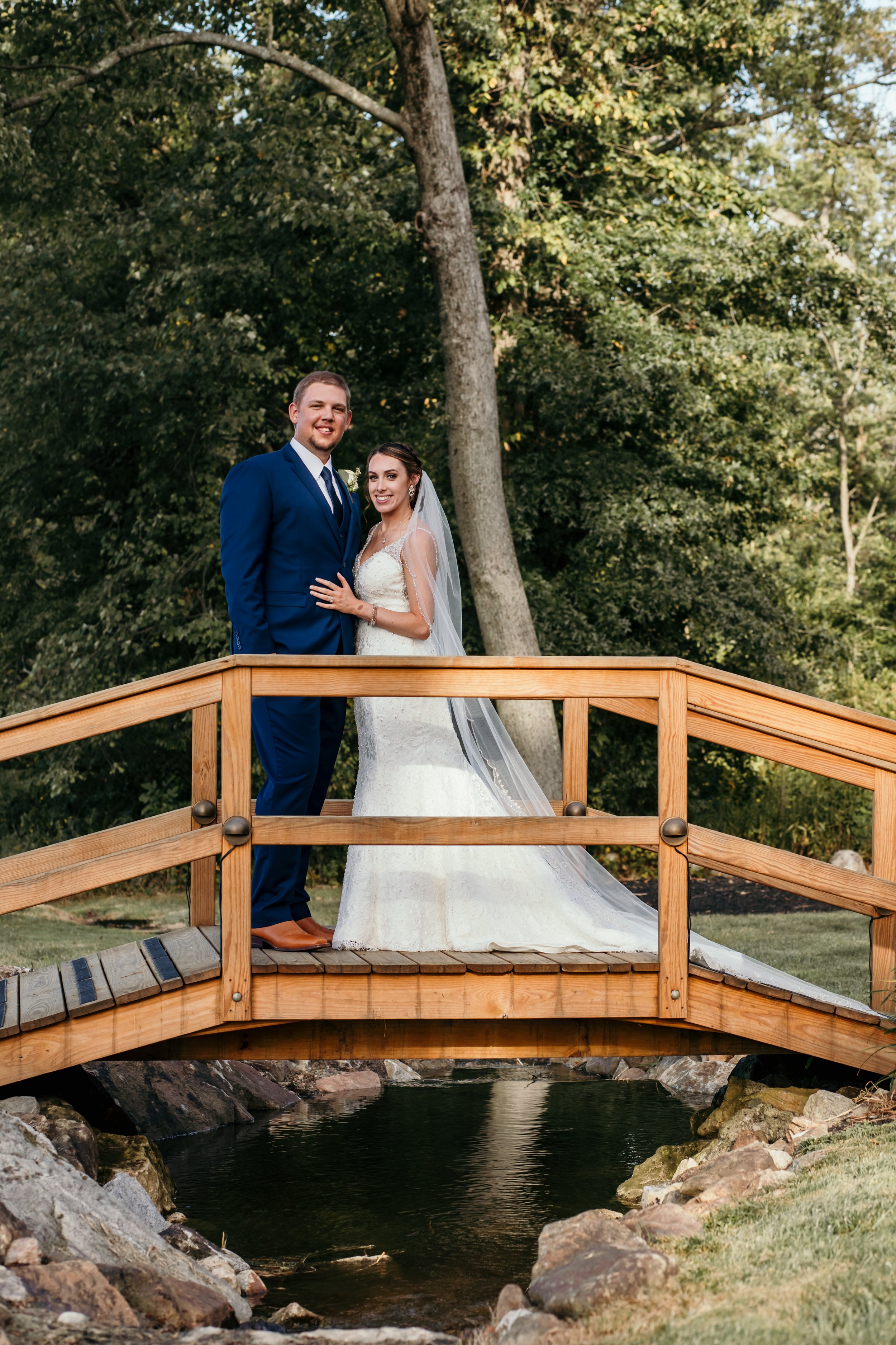 A bride and groom on a bride.