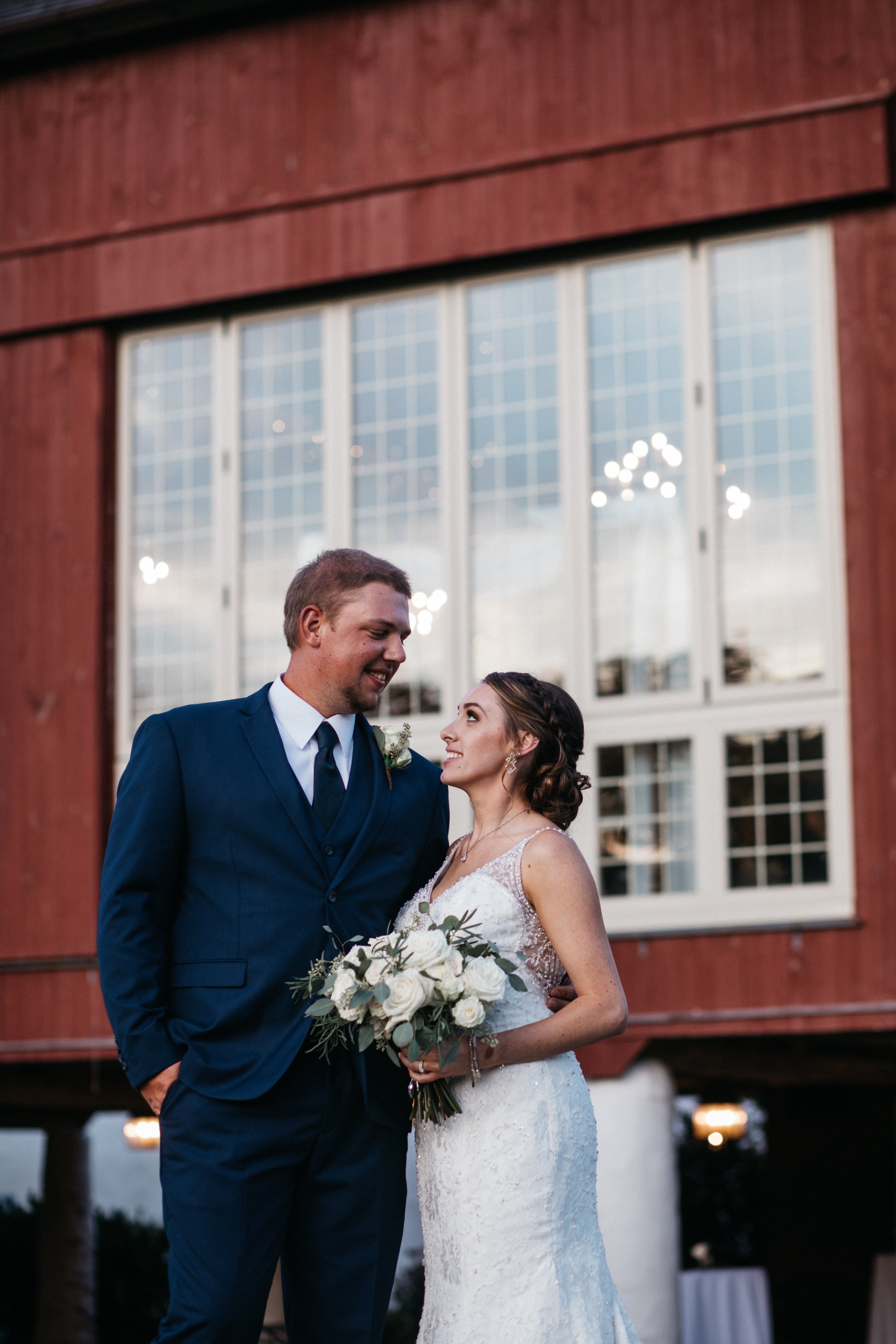 Portrait outside A outdoor wedding ceremony and brandywine manor house.