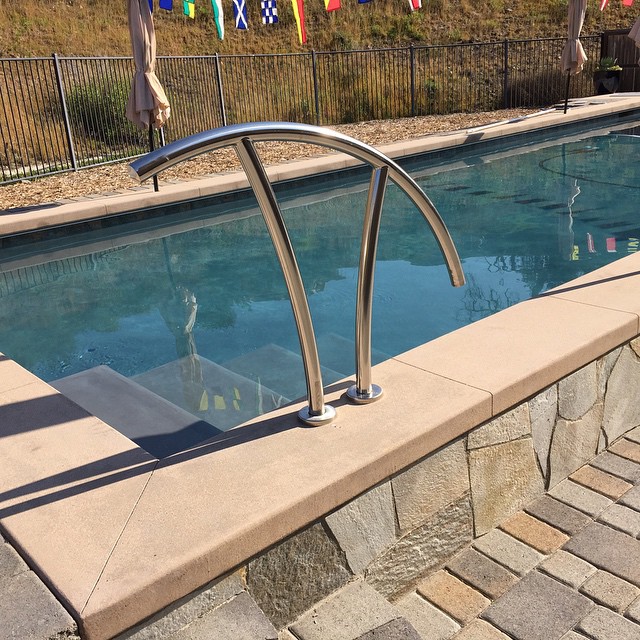 Deco pool entry hand rail