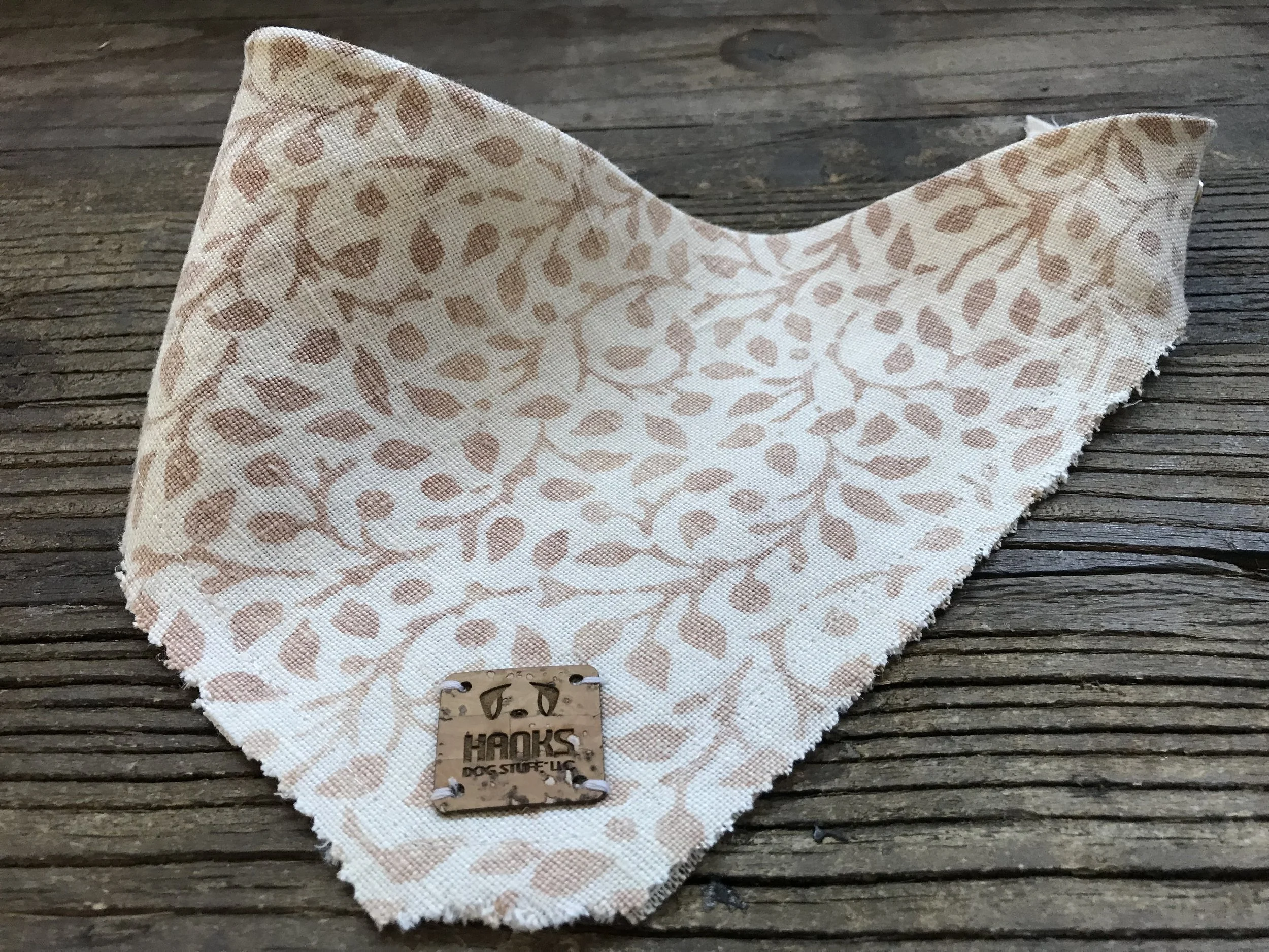 The Shaggy Bandanna - A little ruff around the edges! We are so happy to feature these awesome Bandannas as part of our ‘giving back’ program. We were able to source this fine printed linen fabric from le gracieux, inc. and are so happy we found them! These are made with remnants of their fabric so not all colors are available in every size. Labels are vegan cork. Edges are designed to fray over time. Single tie and snap (or just snap). Can roll down top of bandanna to shorten. Washable For every Shaggy Bandanna sold 1.00 will go towards helping needy pups in our local shelter.