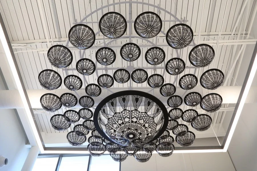 The Dayton Metropolitan Library ceiling sculpture by Virginia Kistler. Laser cut by WE LASERS.