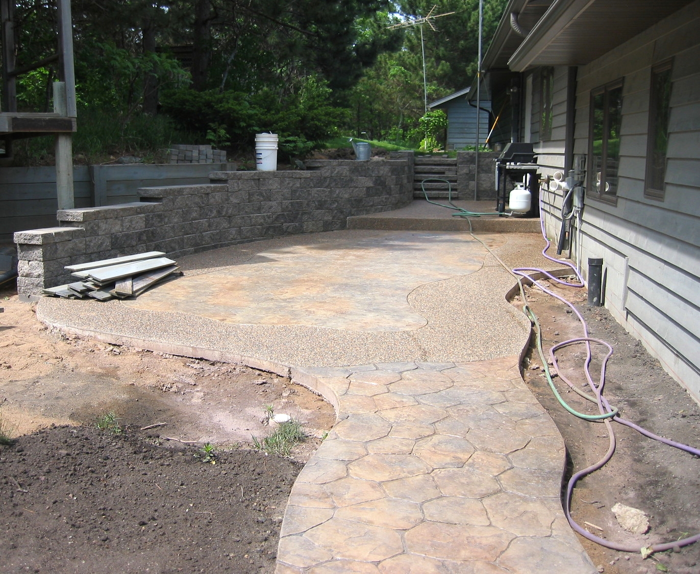 Stamped Patio with Retaining Wall