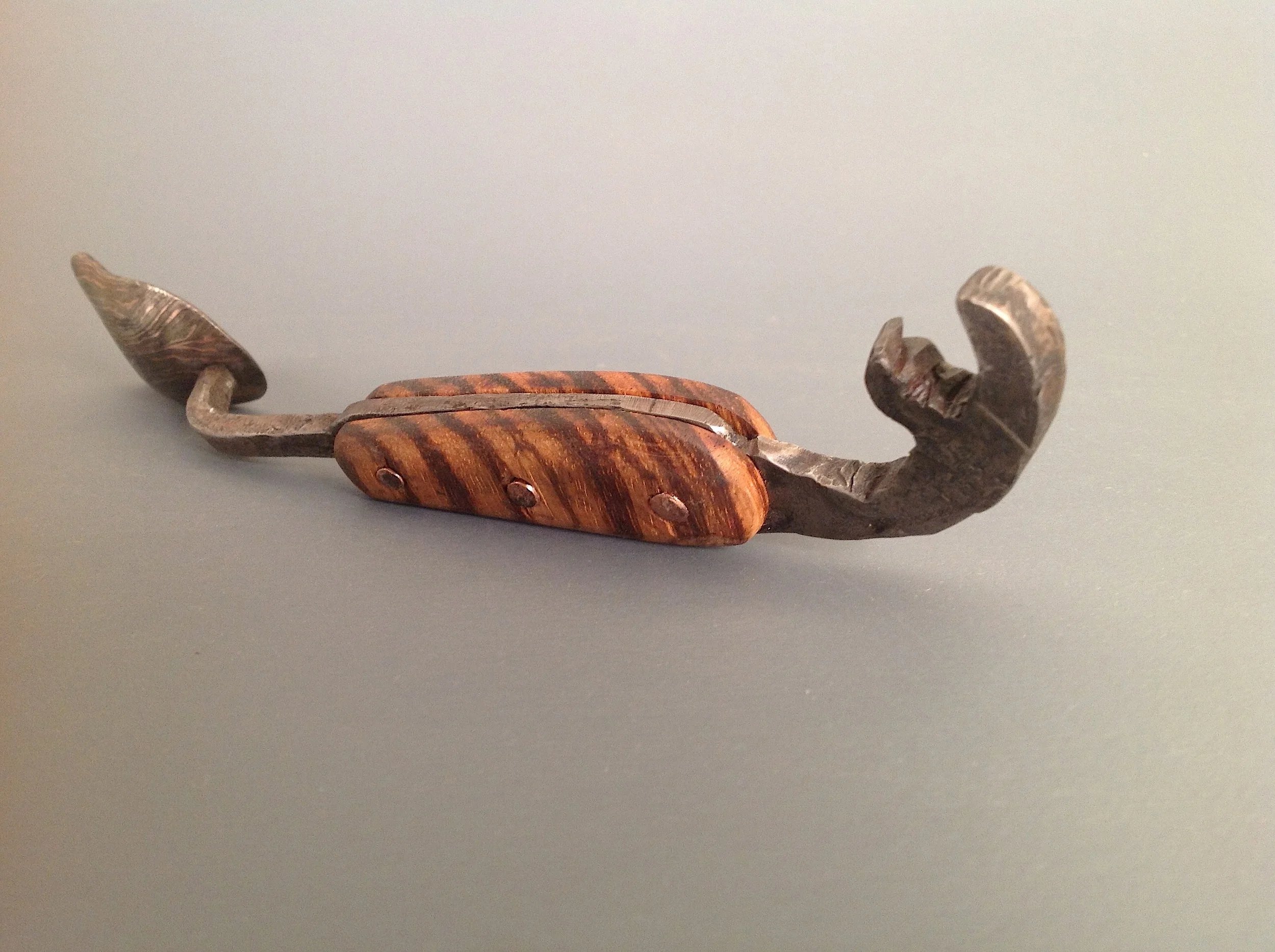 Damascus Steel spoon with bottle opener
