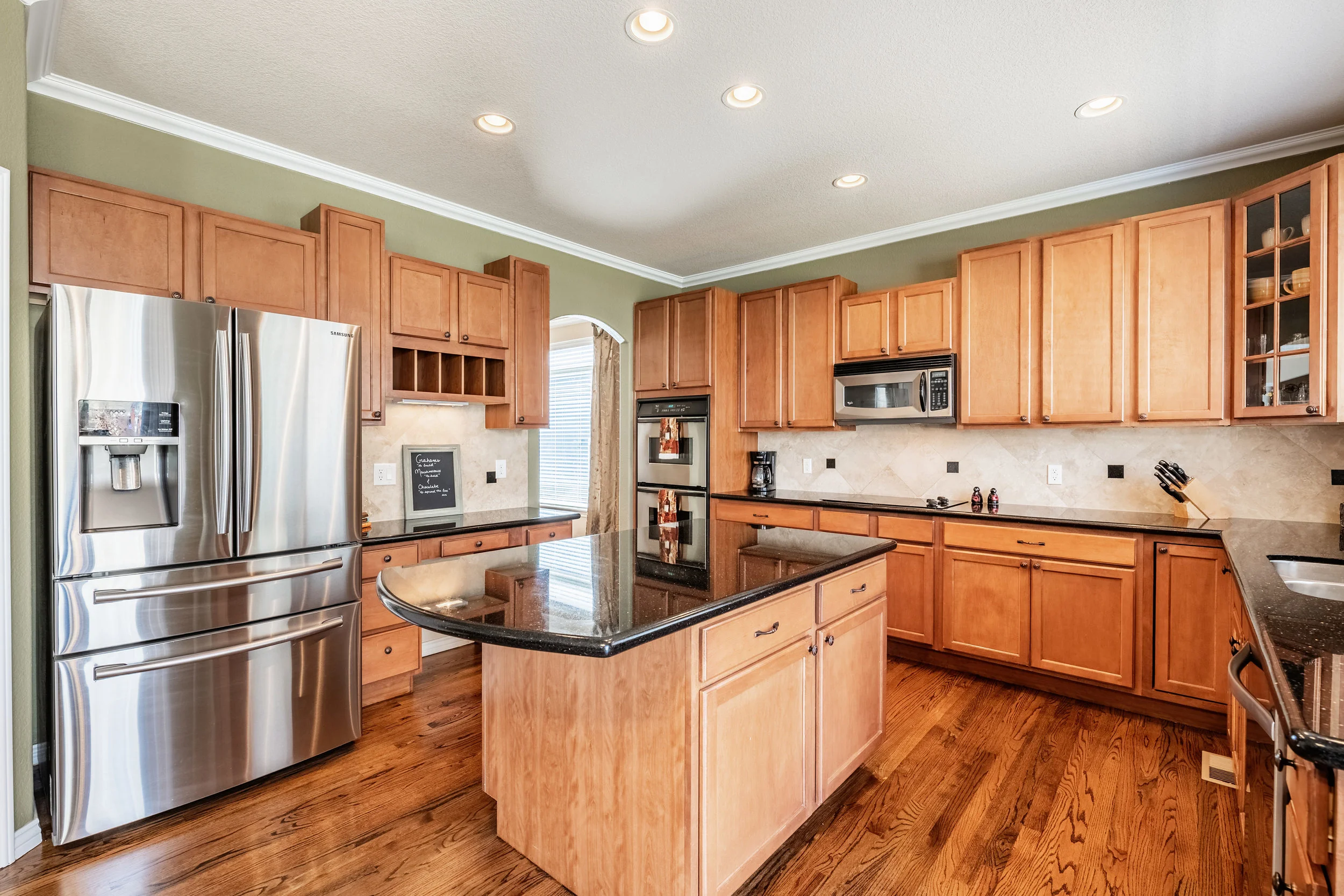 14113 Roaring Fork Cir-print-010-26-Kitchen-4200x2801-300dpi.jpg