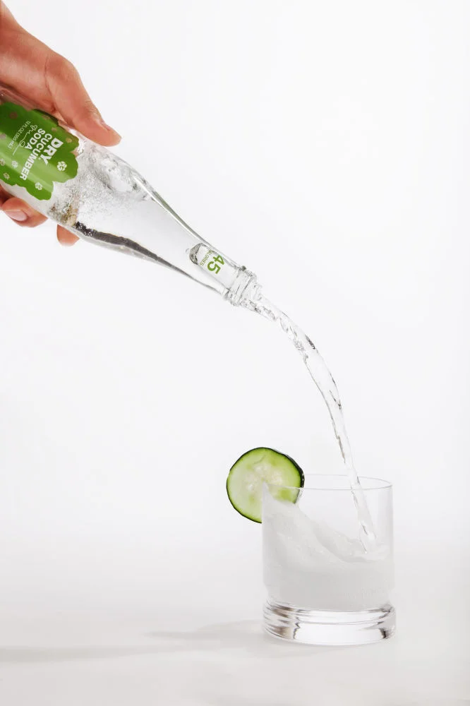 dry soda drink pour cucumber hand ad spencer wallace photo
