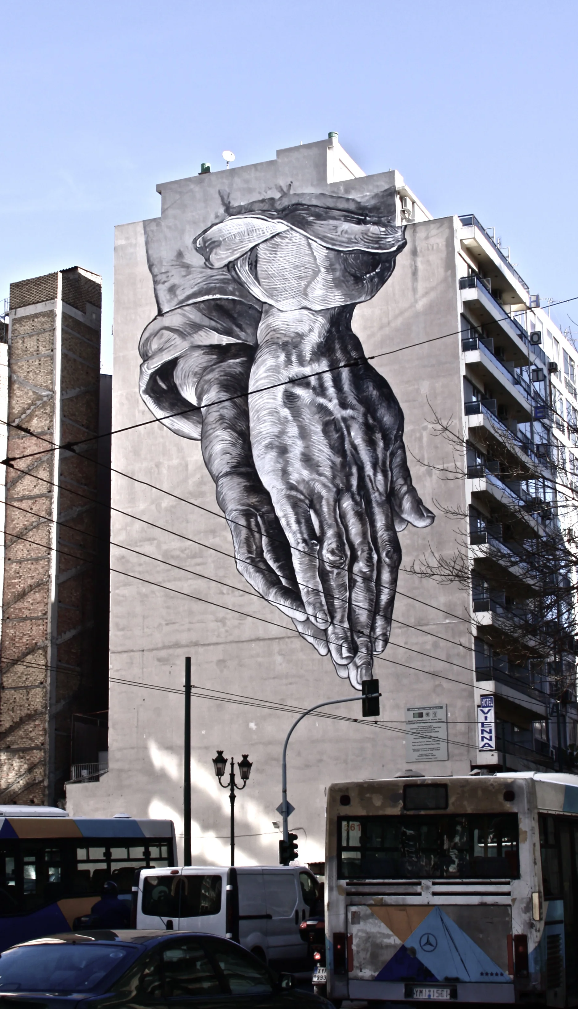 07 Praying hands street art on P. Tsaldari street, Athens.jpg