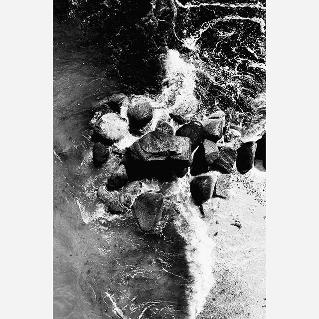 Black waves. White foam. Heavy wind. Chrushing stones. #photography #blackandwhite #blackandwhitephotography #artwork