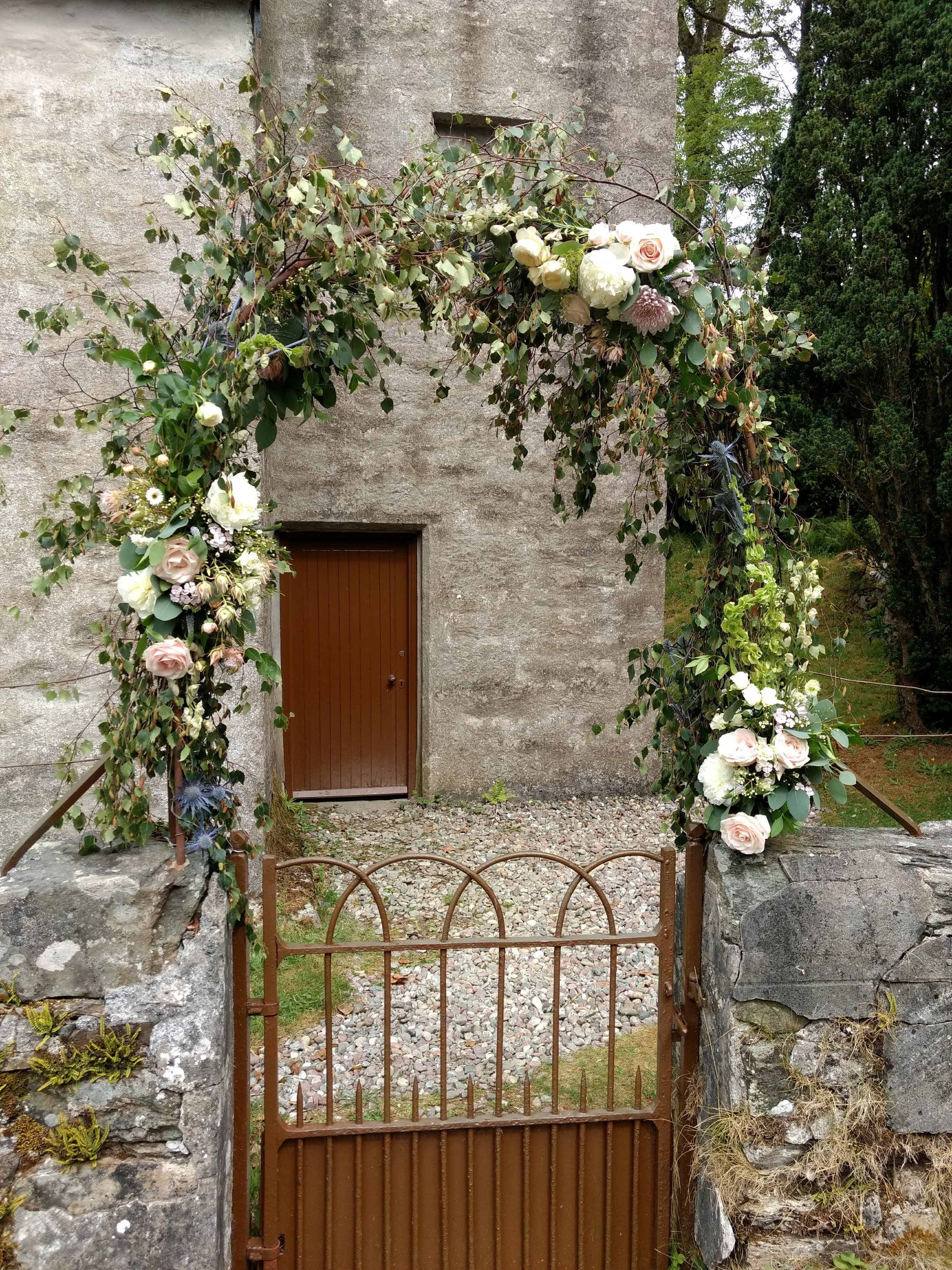 Church wedding arches with flowers | Honestweddingadvice.com