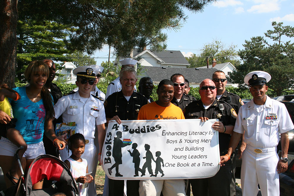 Men, Women in uniform take literacy to Toledo streets.