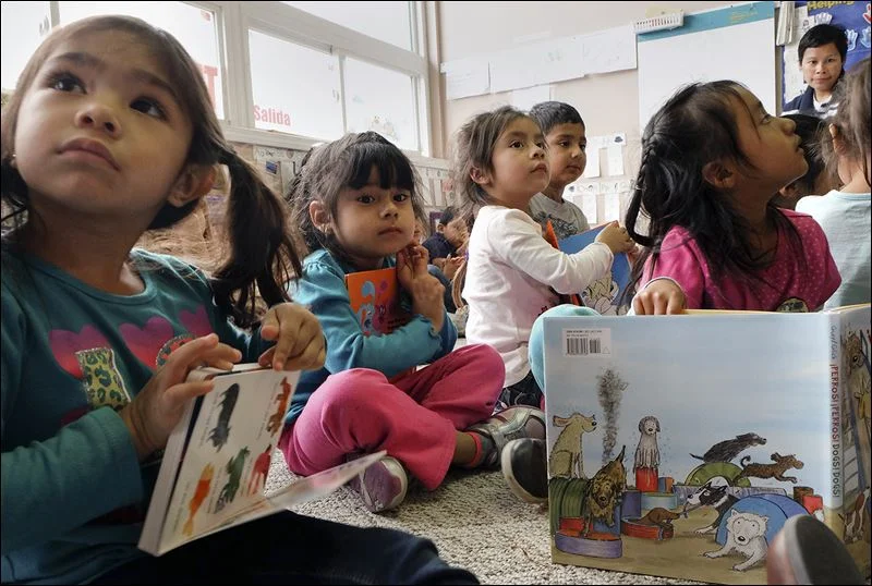 Stories shared in Spanish: Volunteers read as part of Books 4 Buddies