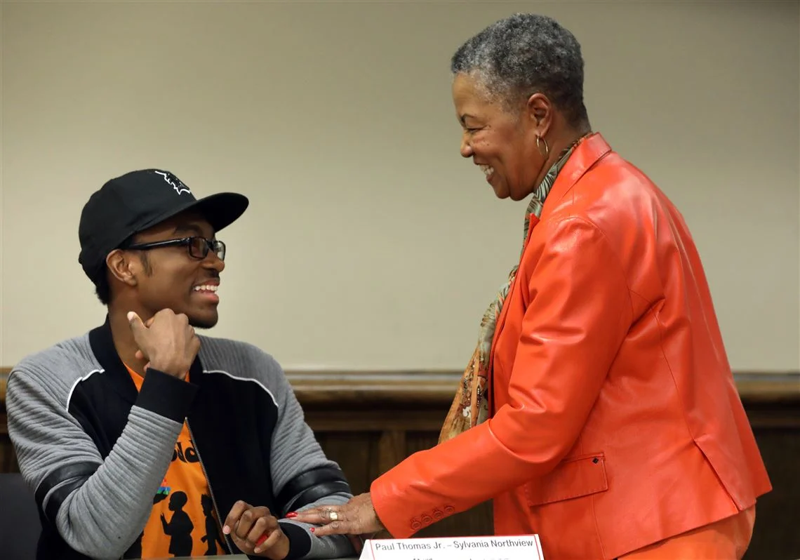 International teens share Toledo experiences at library.