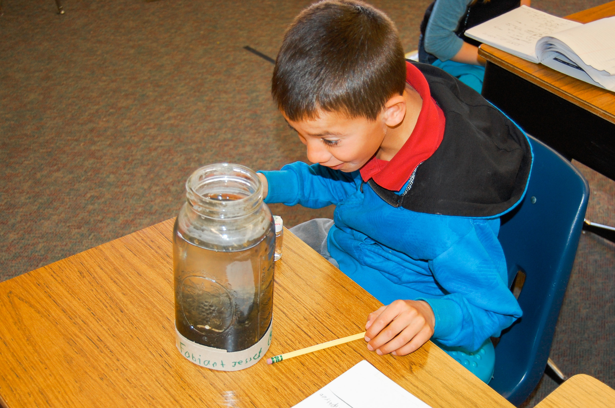 This expression says it all! Students are amazed to watch a pond ecosystem develop in a jar. Hands-on, content-rich and fun.....how education should be!