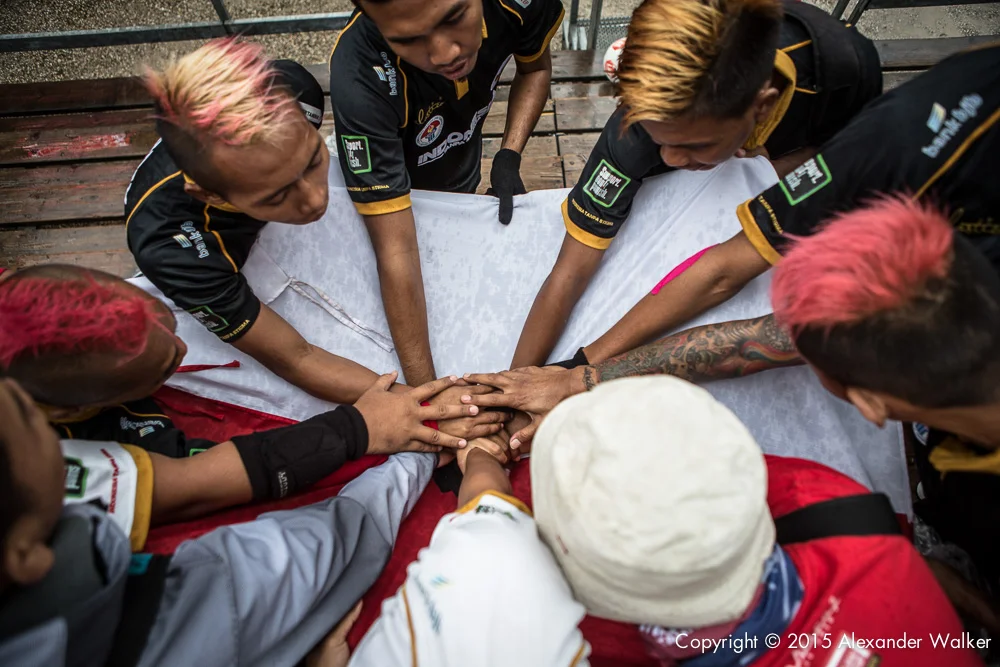 Team Indonesia praying before a match.
The Homeless World Cup is a unique, pioneering social movement which uses football to inspire homeless people to change their own lives. Homeless World Cup 2015 is taking place in amsterdam from september 12th to September 19th. For more information, visit www.homelessworldcup.com