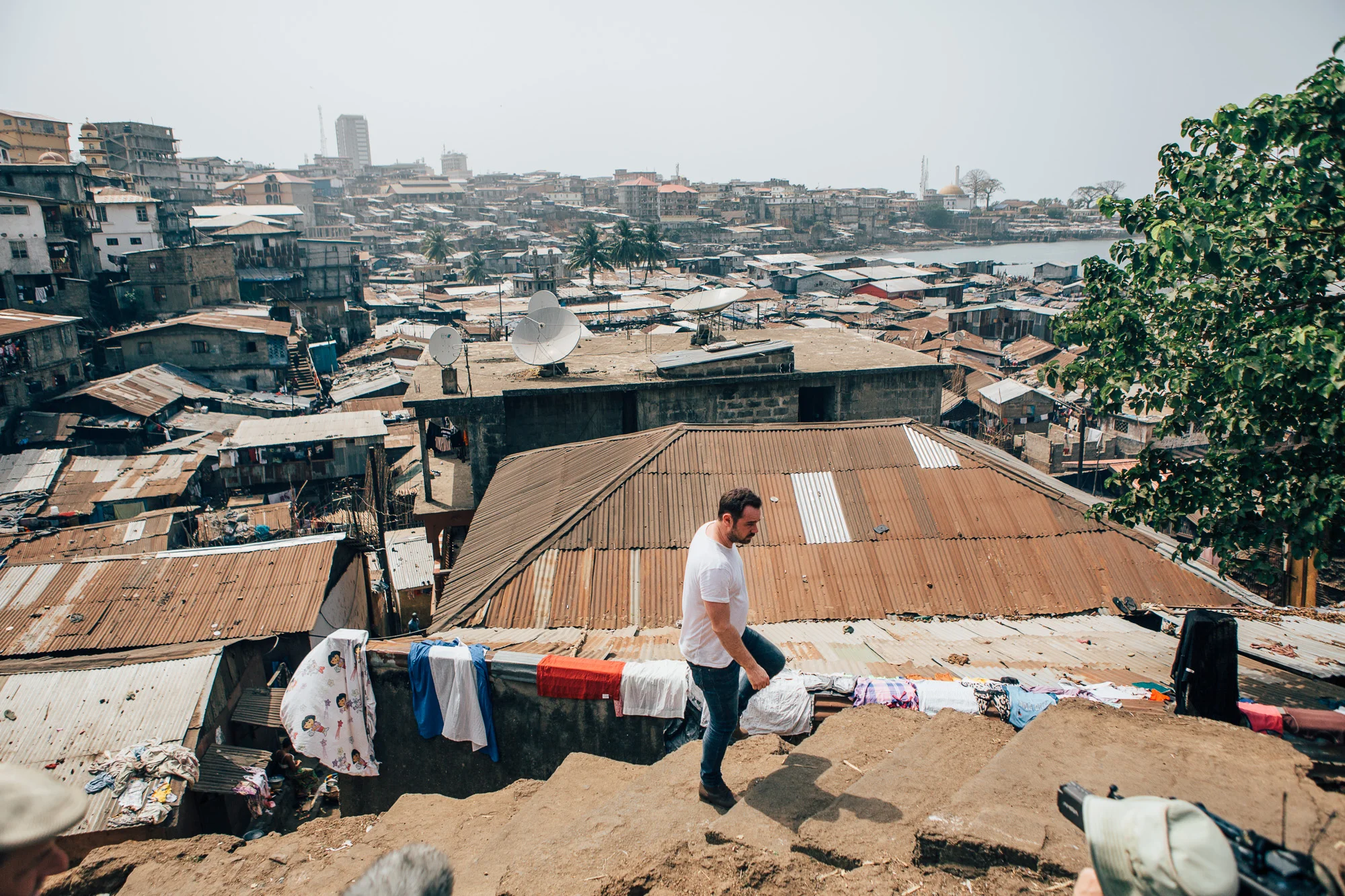 Danny Dyer visits a slum in Freetown supported by Y-Care international and local partner YMCA Sierra Leone. Comic Relief Awarded these projects funds to provide 1800 unemployed young people with training, academic skills as well as metoring to assist them in finding jobs. In addition awareness raising campaigns on hygine, with a bid to educating the population on the causes and spread of Ebola.