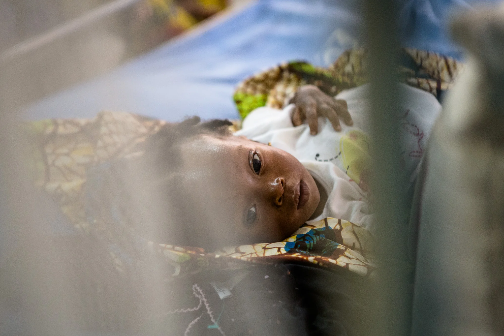 Aminata Kanneh is fortunate enough to be on a bed with a Mosquito Net, which is a primary preventative measure against the spread of malaria. OLA During Childrens Hospital, GAVI Alliance. Comic Relief has funded GAVI since 2012 and awared funds in 2014 to purchace and deliver three lifesaving Vaccines to hundres of thousands of children in a selected number of African countries. Immunisation is one of the most effective ways of preventing children from dying from diseses. In africa alone, 600,000 children each year could be saved in vacccine programmes were fully implemened. Most countries have now introduced immunisation programmes in their national health plans, but almost a quater of african children are stil not being vaccinated adequately.