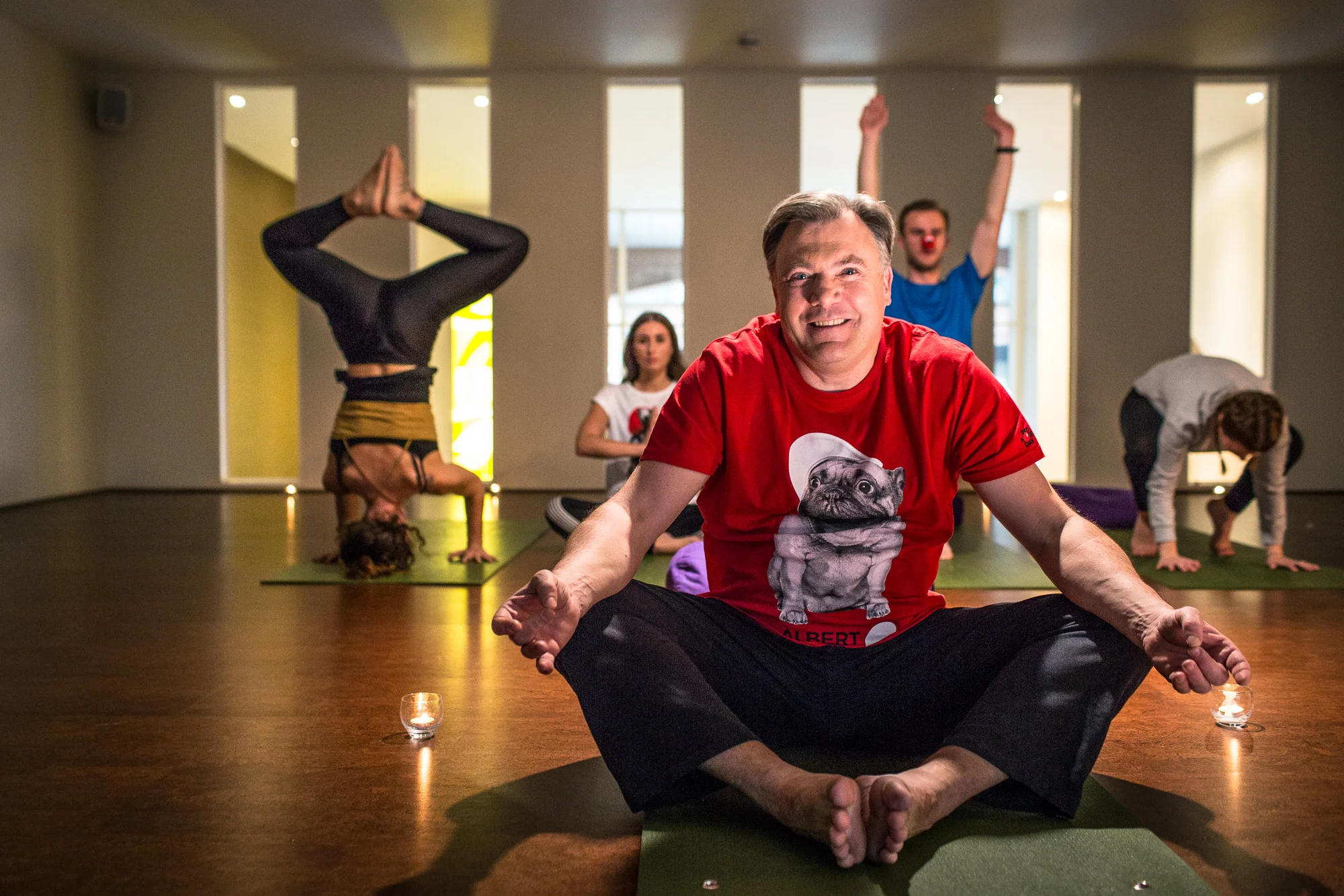 Ed Balls doing yoga at Embody Wellness for Red Nose Day 2017