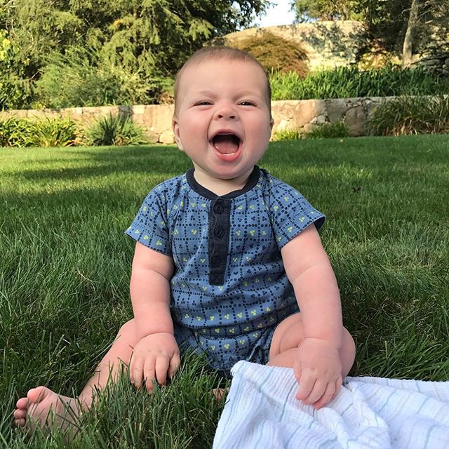 First time sitting himself up from tummy. I can't keep this little guy from moving all over now. He loves to pull the grass. #LCOMAugust #summer #happybaby #parkerb #teacollection #smile