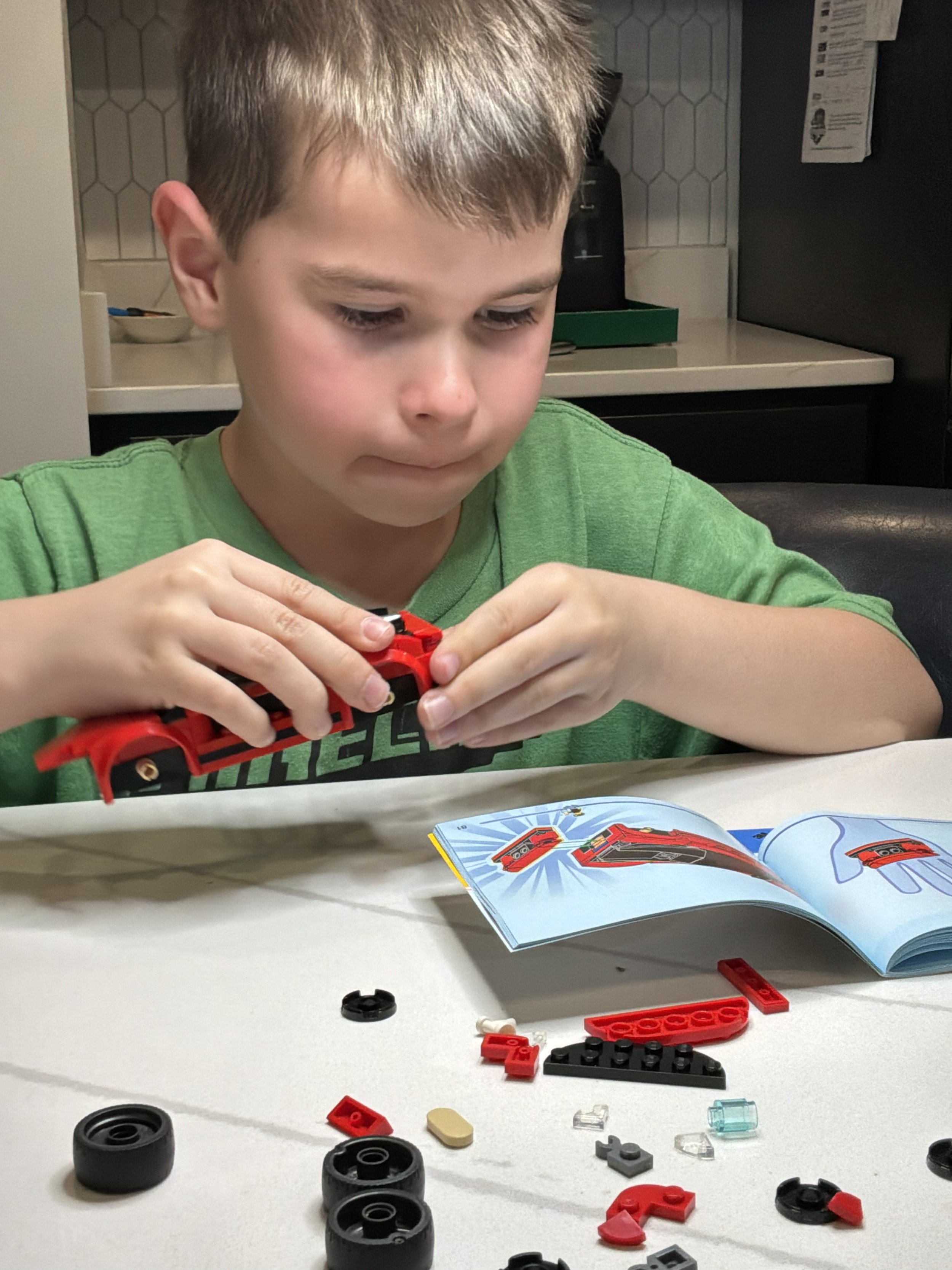 child concentrating on creative play at home