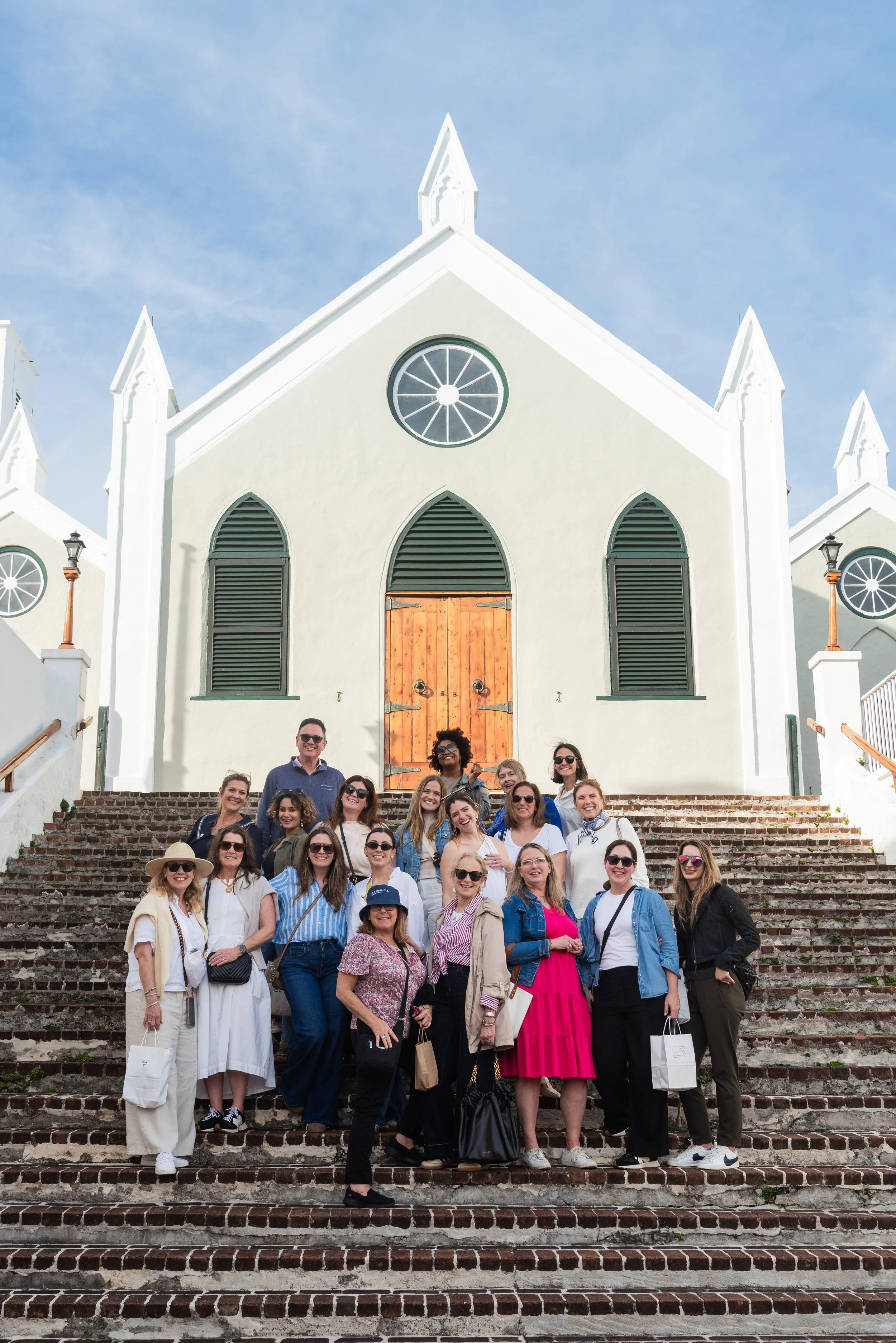  Kristin White poses with her tour group during a walking tour in St. George’s Historic Town on January 7, 2026. 