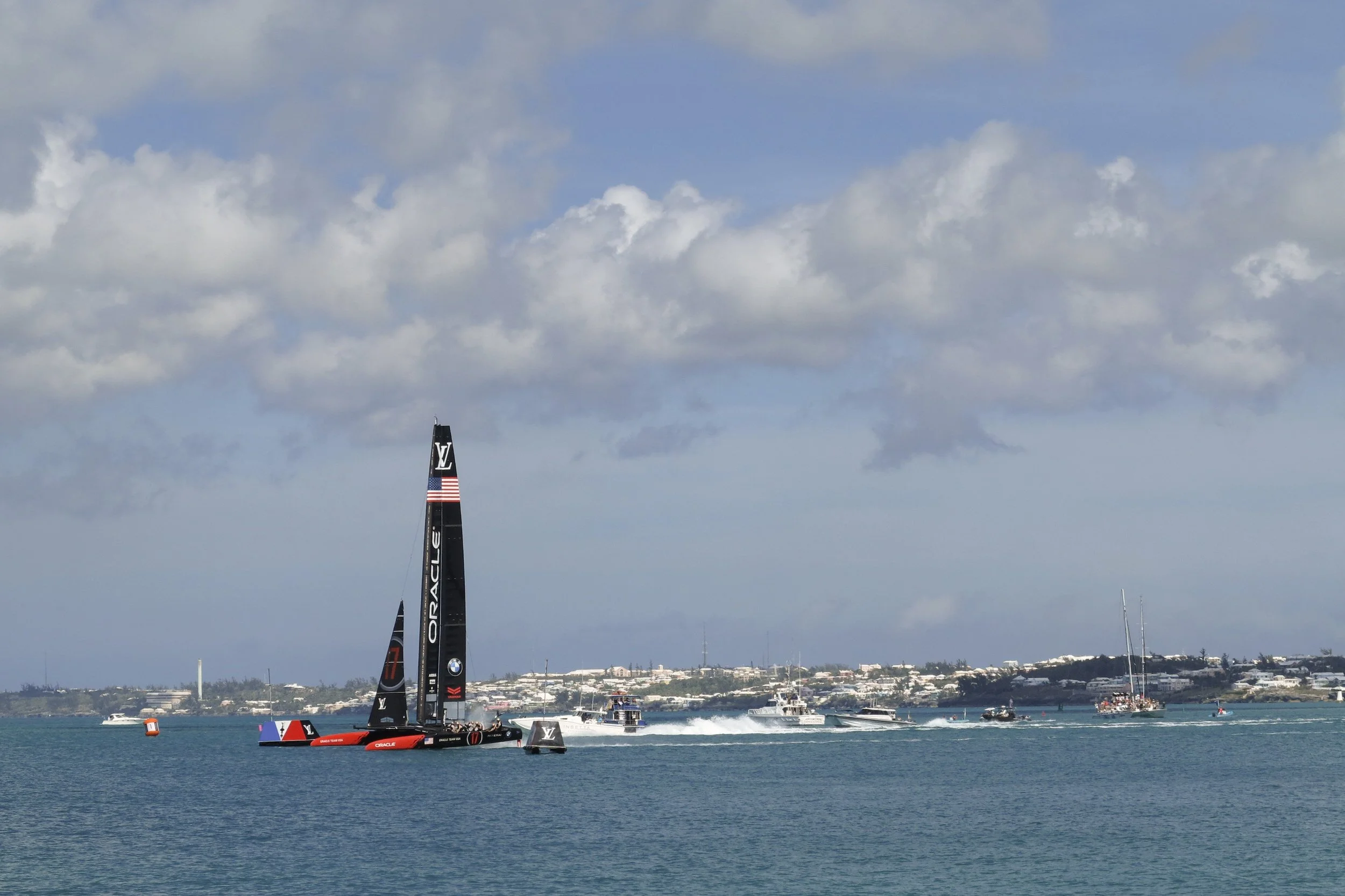  Oracle Team USA pulls ahead of Emirates Team New Zealand to win a race on Opening Day of the 35th America’s Cup in Bermuda on May 27, 2017. 