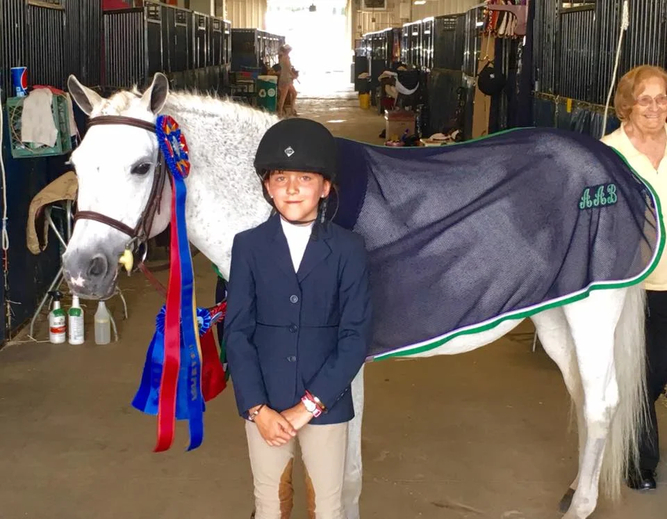 Addison Basile and Silver Icing Short Stirrup Champions