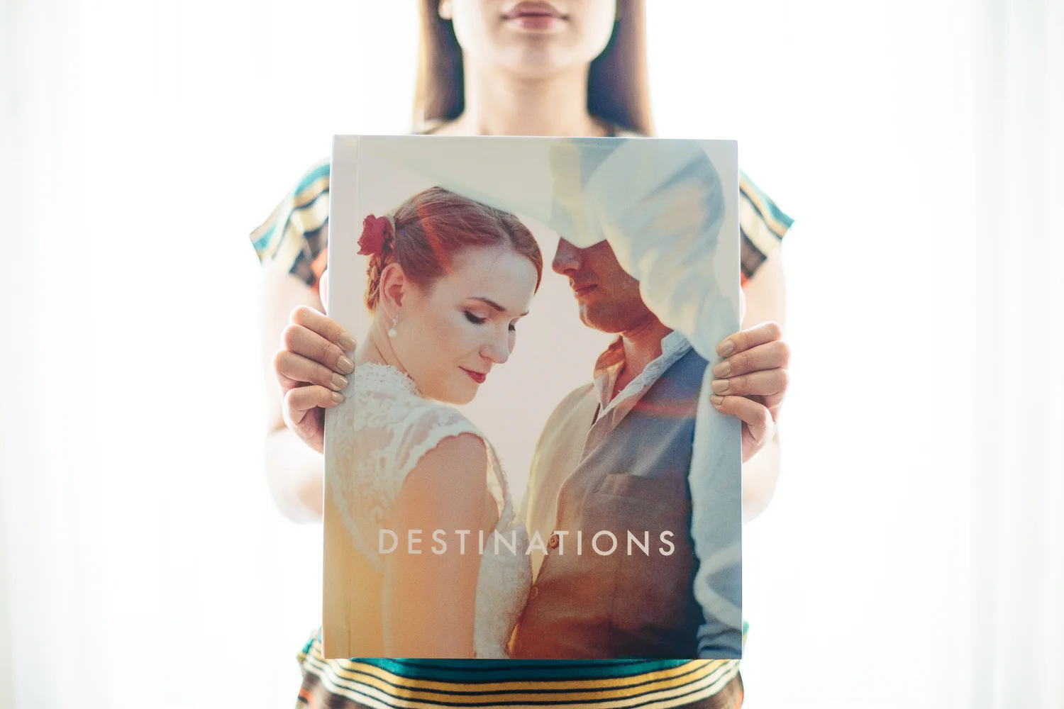 The Classic Coffee Table Album: 11" x 14" portrait orientation, hardcover, available in printed matte or canvas.