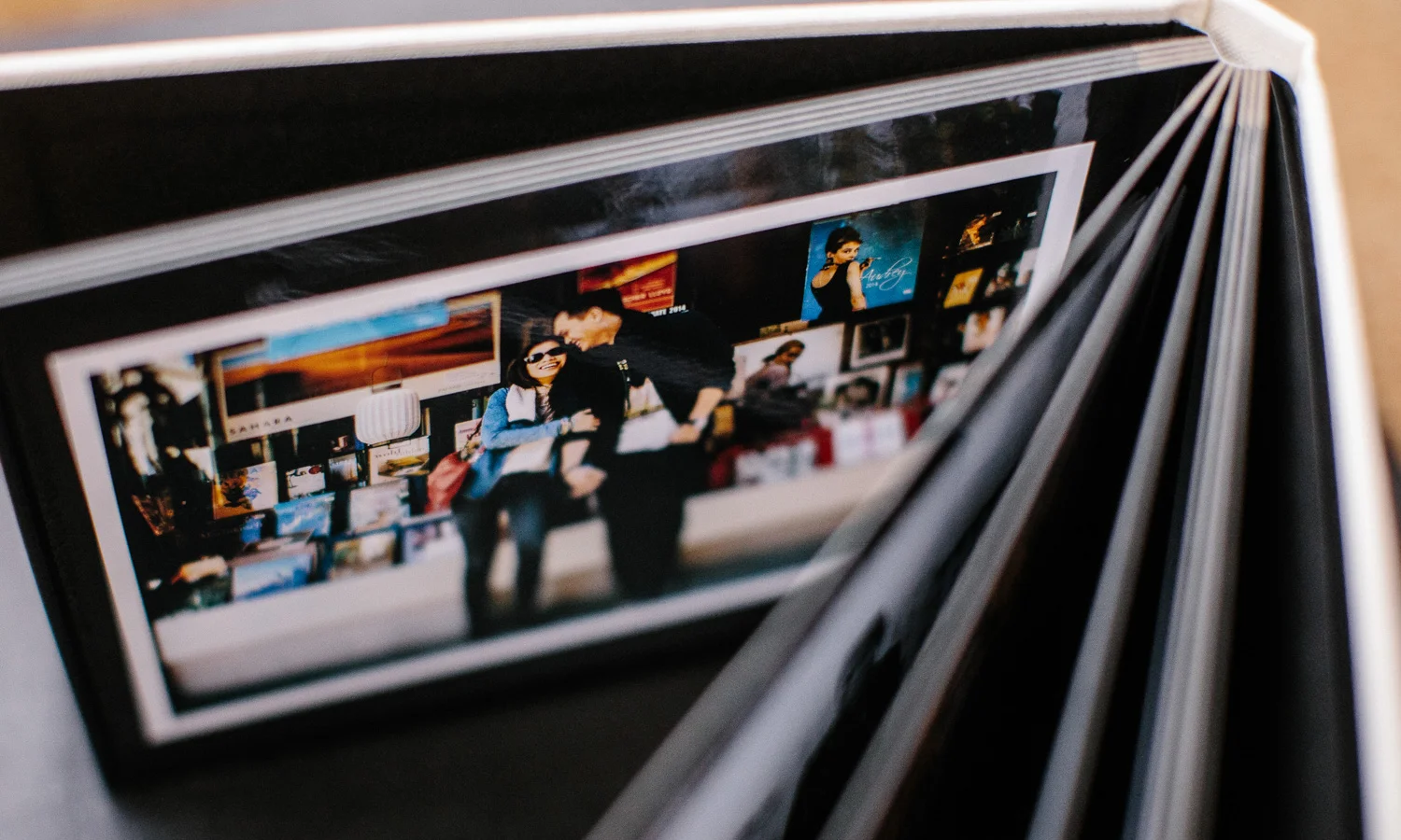 4R prints in an old school Muji photo album.